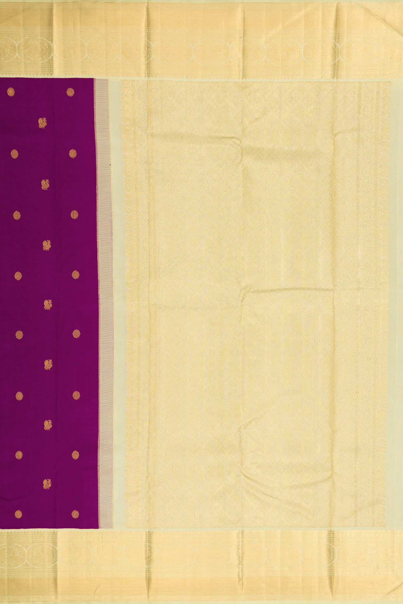 Close up image of the pallu of Purple Dual Tone Kanjivaram Silk Saree with Zari Butta on the body and Zari Border. 