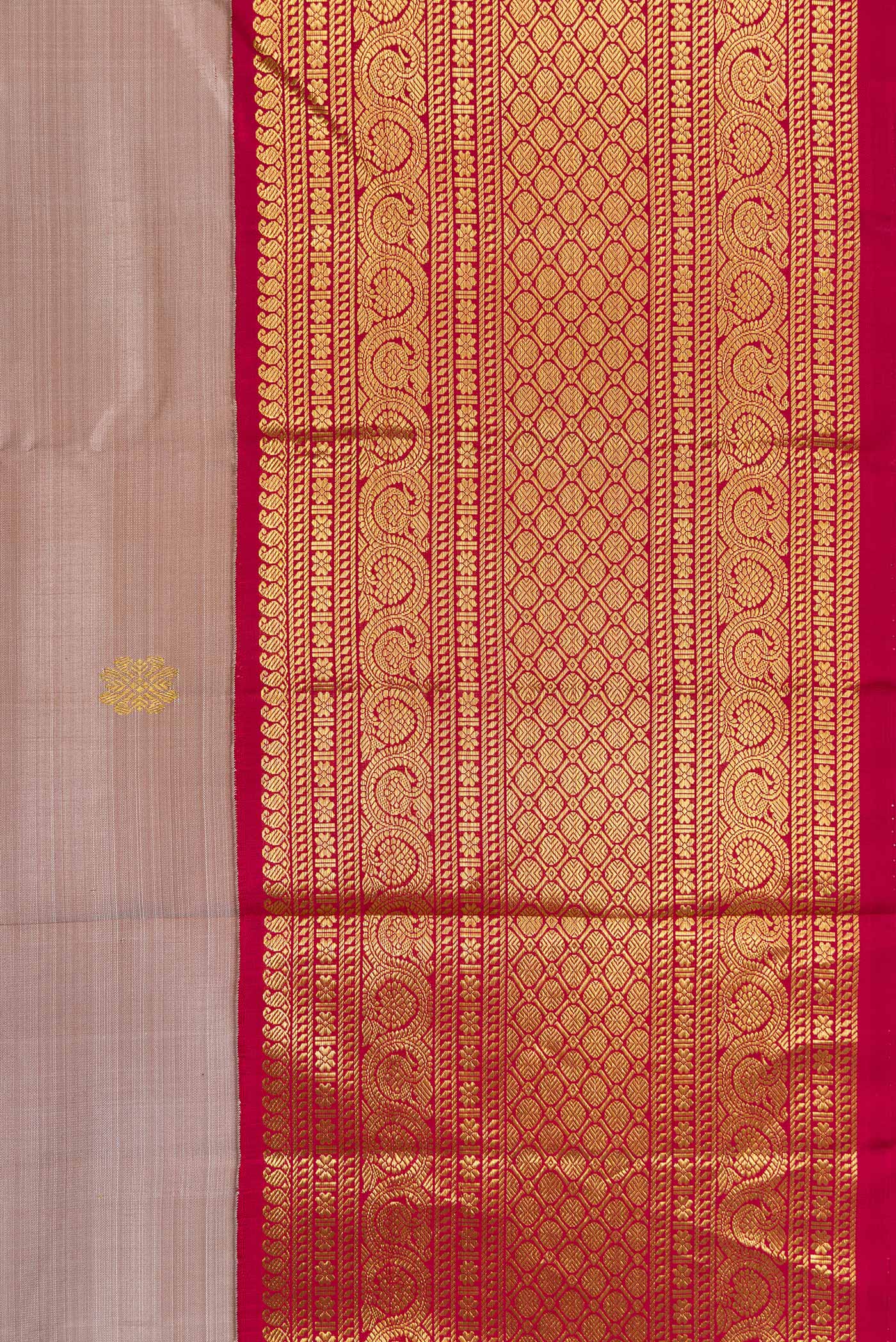 Border image of Dark Beige Dual Tone Kanjivaram Silk Saree with Zari Butta on the body and Zari Border. 