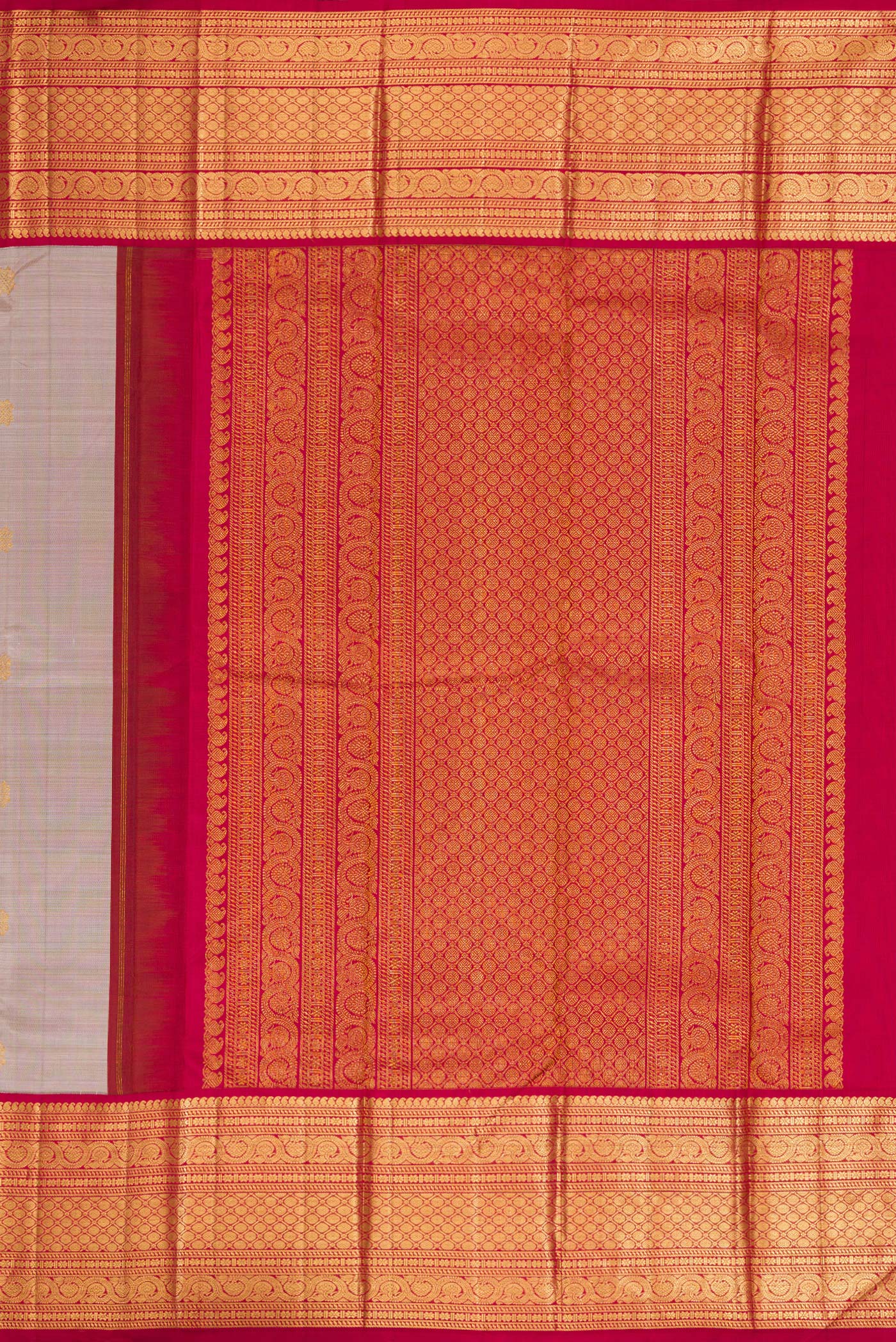 Close up image of the pallu of Dark Beige Dual Tone Kanjivaram Silk Saree with Zari Butta on the body and Zari Border. 