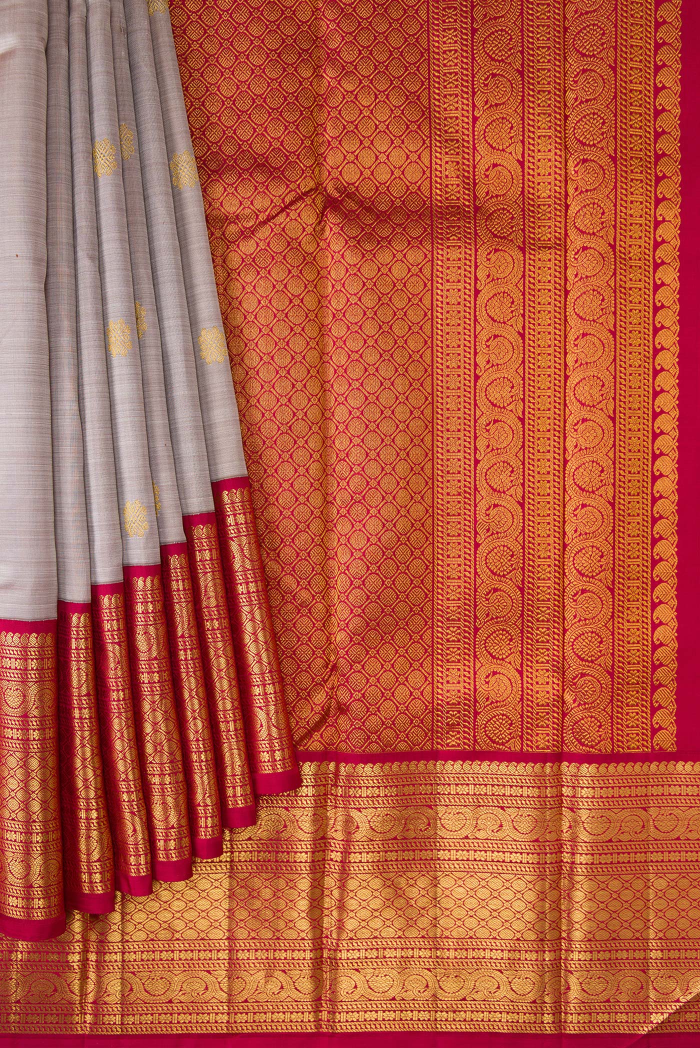 Pleats and pallu of Dark Beige Dual Tone Kanjivaram Silk Saree with Zari Butta on the body and Zari Border. 