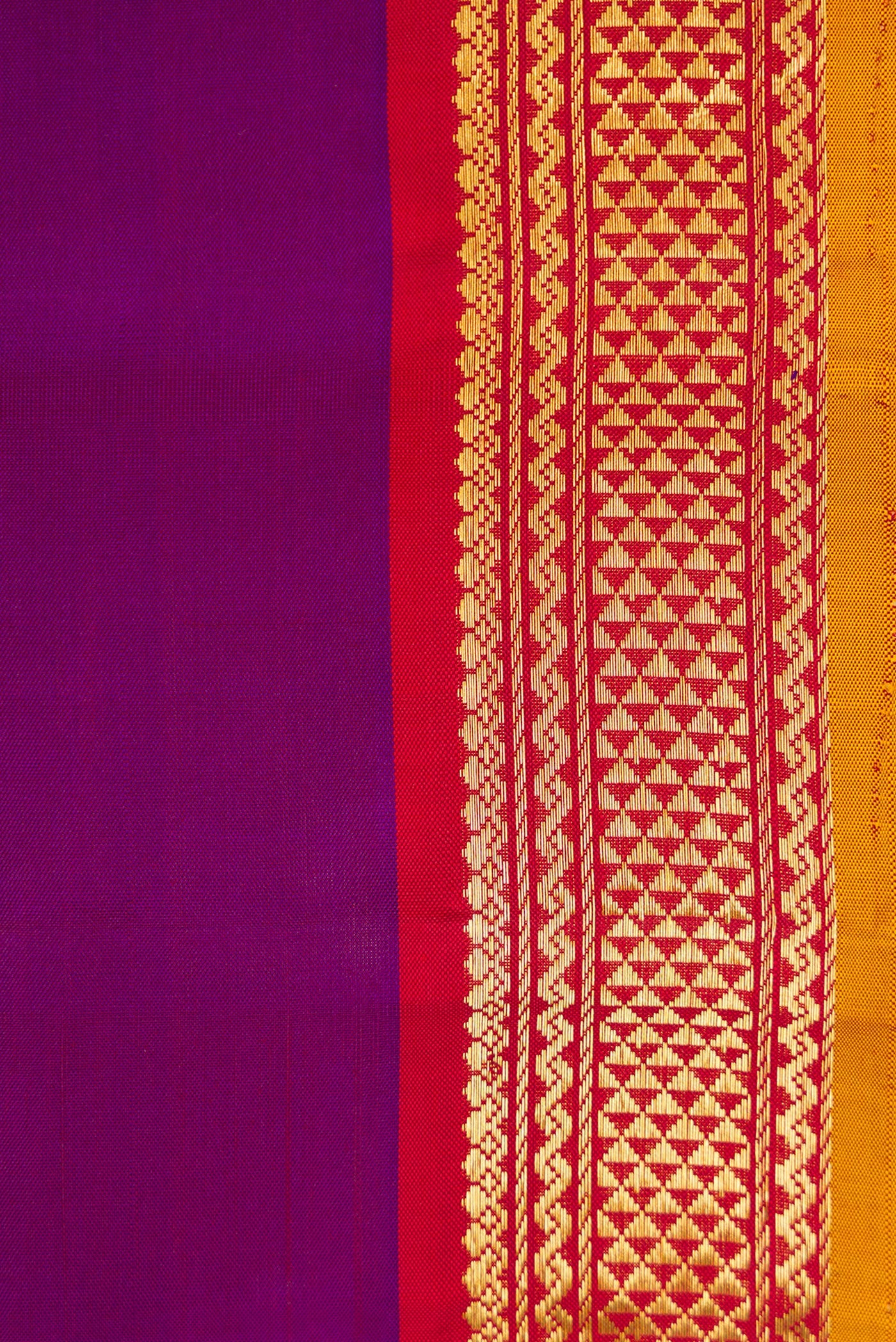 Border image of Pure Silk Pure Zari Purple Dual Tone Kanjivaram Saree with Plain Body and Zari Border. 
