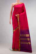 Dark Pink Dual Tone Kanjivaram Silk Saree with Plain Body and Zari Border.  displayed on a mannequin