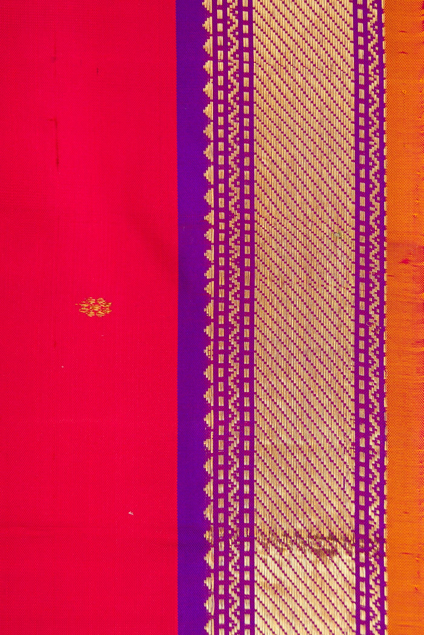 Border image of Red Dual Tone Kanchipuram Silk Saree with Zari Butta on the body and Zari Border. 