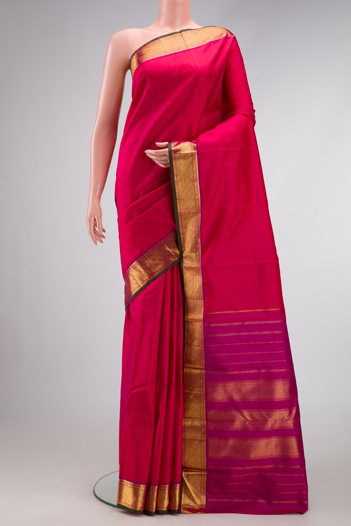 Pure Silk Pure Zari Dark Pink Dual Tone Kanchipuram Saree with Plain Body and Zari Border.  displayed on a mannequin