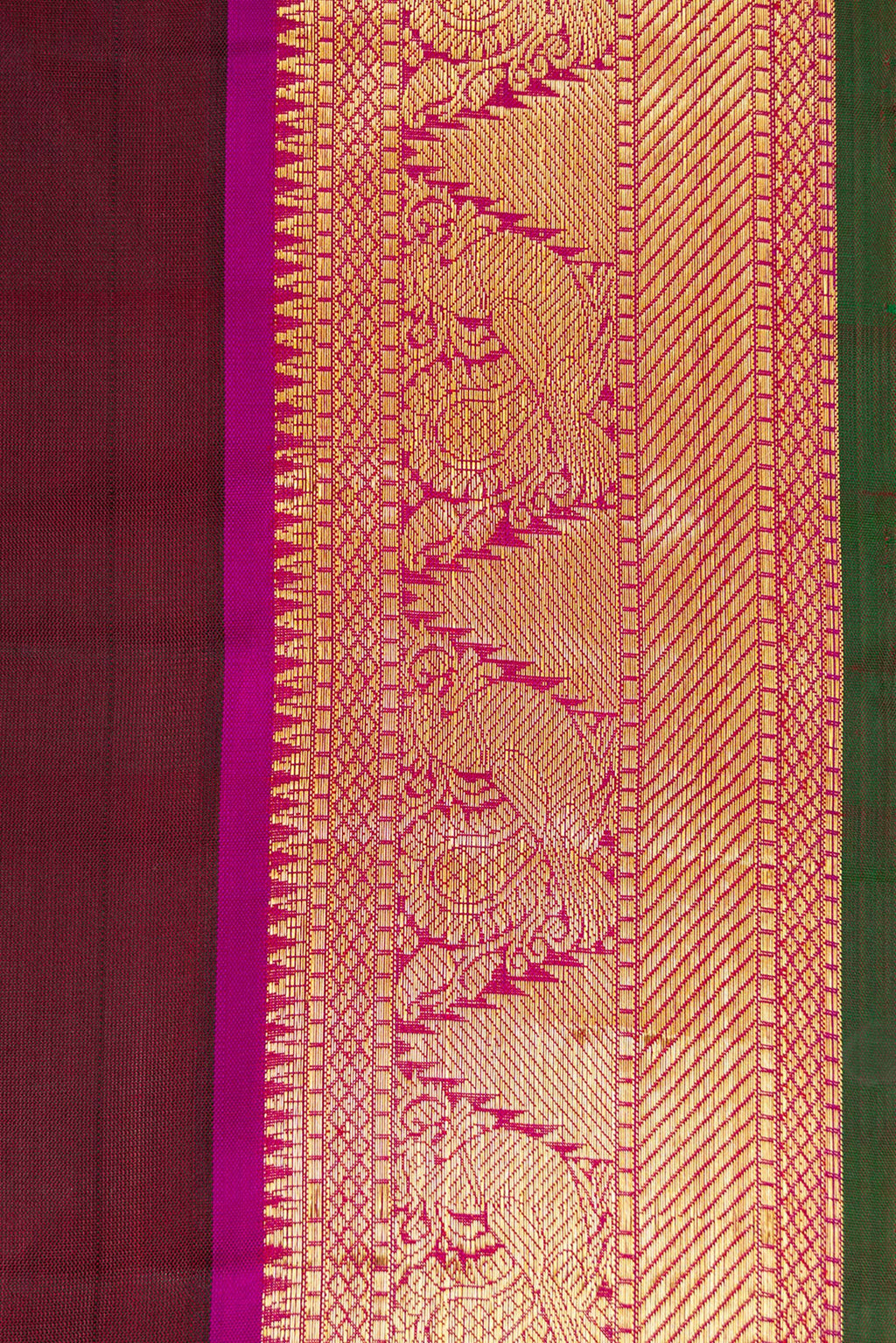 Border image of Maroon Dual Tone Kanchipuram Silk Saree with Plain Body and Zari Border. 