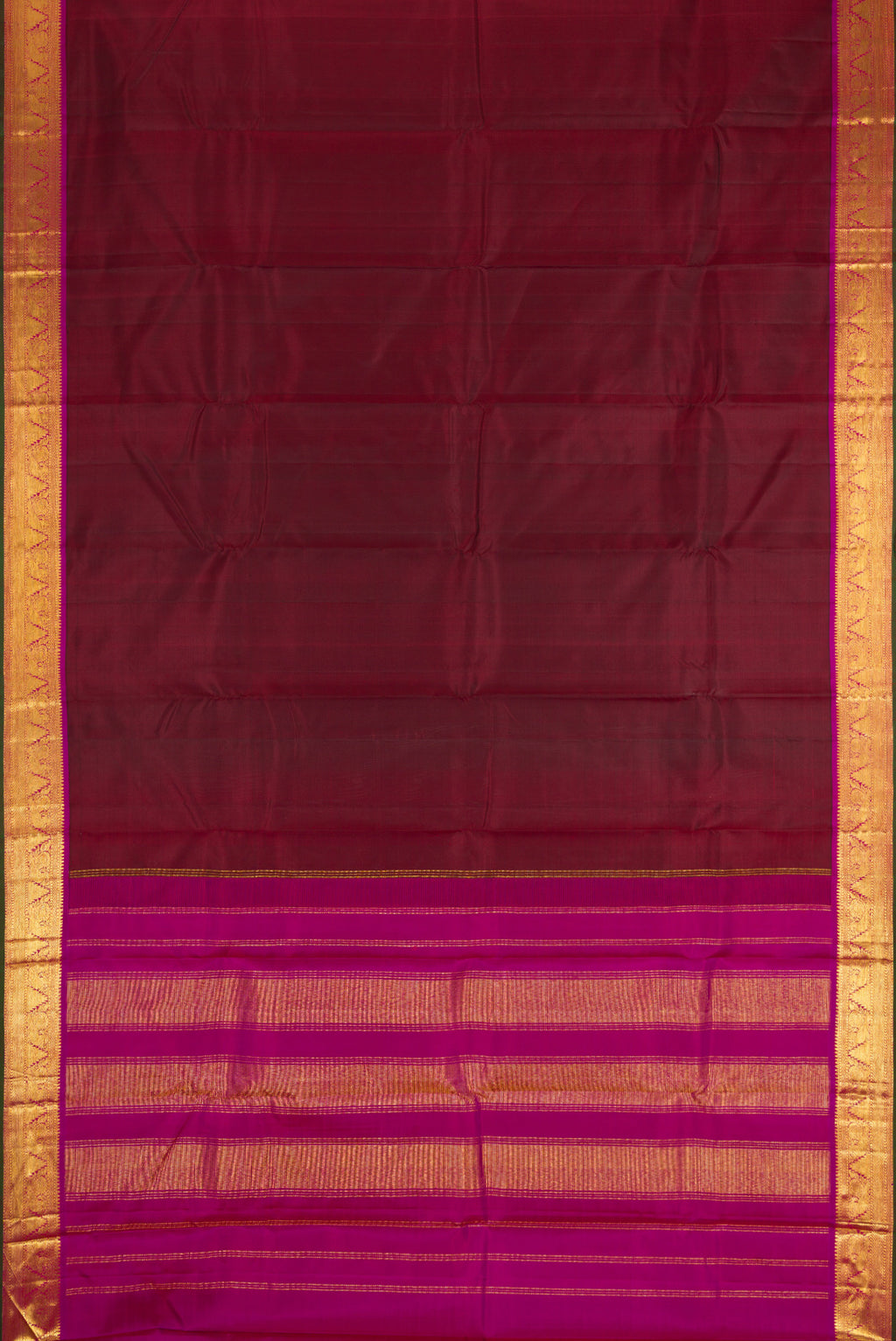 Flat view of Maroon Dual Tone Kanchipuram Silk Saree with Plain Body and Zari Border. 