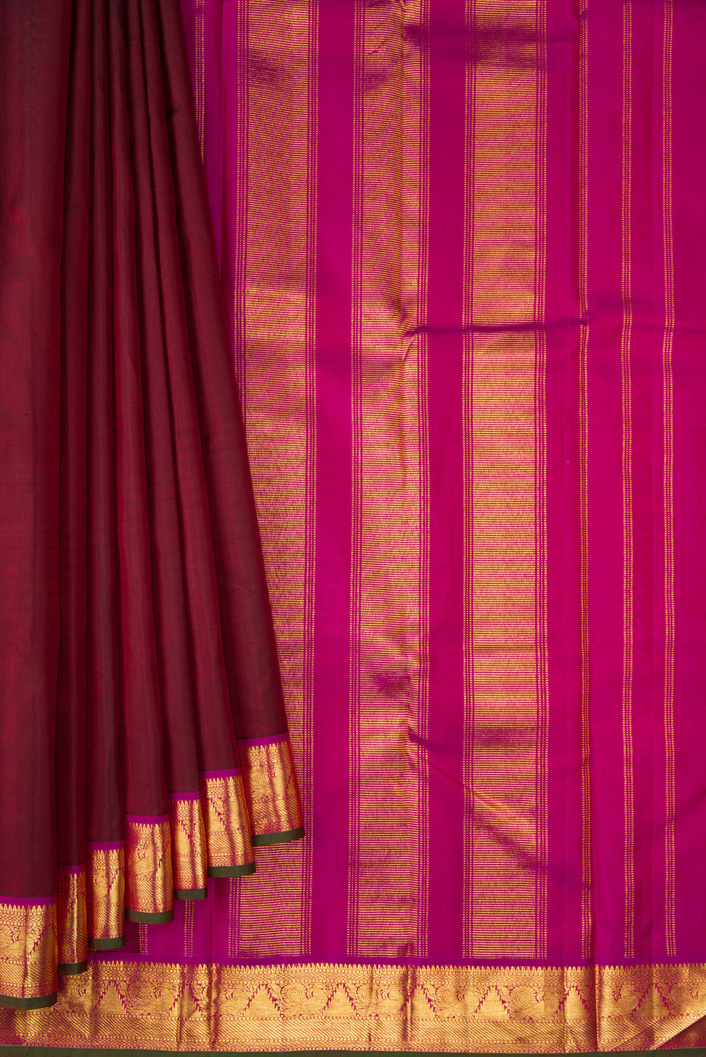 Pleats and pallu of Maroon Dual Tone Kanchipuram Silk Saree with Plain Body and Zari Border. 