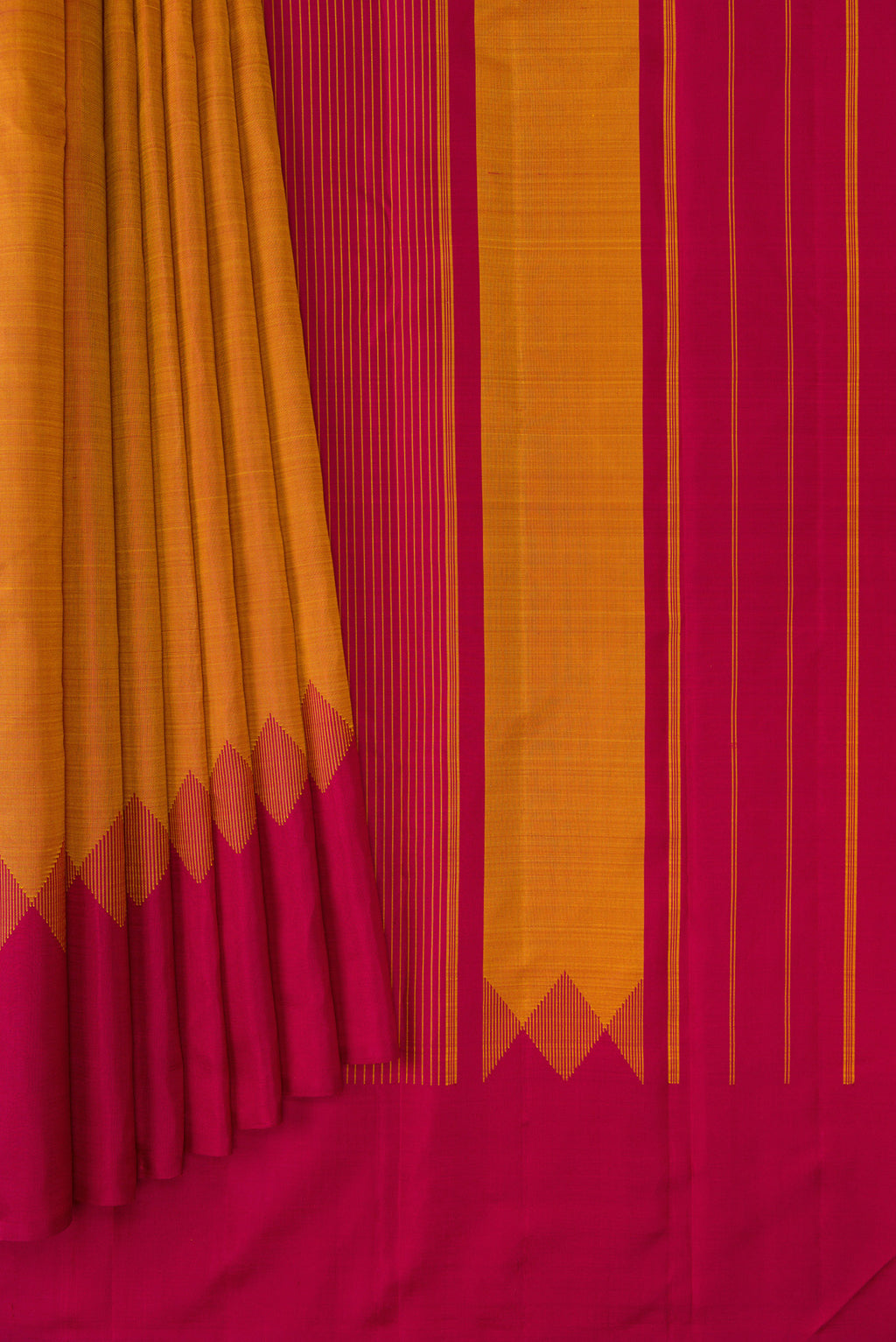 Pleats and pallu of Mustard Dual Tone Kanjivaram Silk Saree with Plain Body and Fancy Border. 