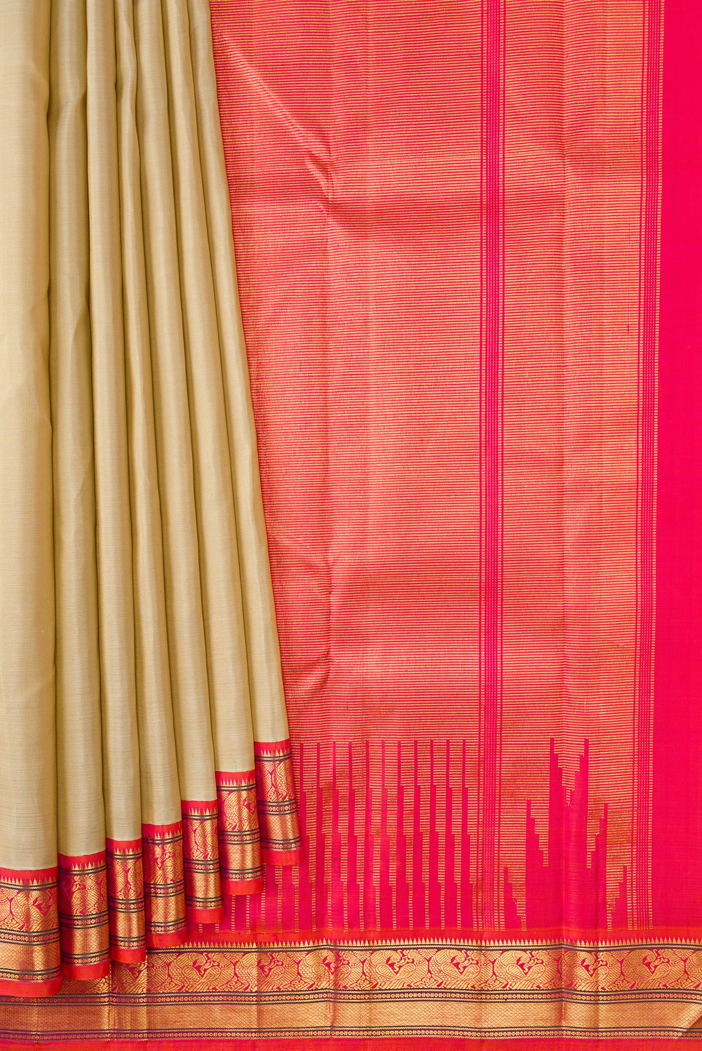Pleats and pallu of Beige Dual Tone Kanjivaram Silk Saree with Zari Butta on the body and Zari Border. 