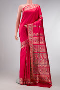 Pink Dual Tone Baluchari Silk Saree with Zari And Thread Butta on the body and Zari Border.  displayed on a mannequin