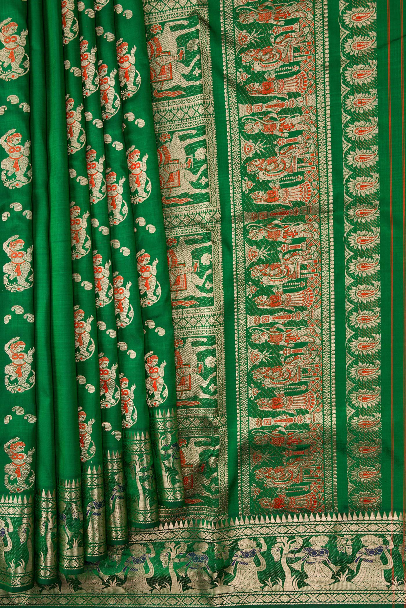 Pleats and pallu of Green Dual Tone Baluchari Silk Saree with Zari And Thread Butta on the body and Thread Border. 