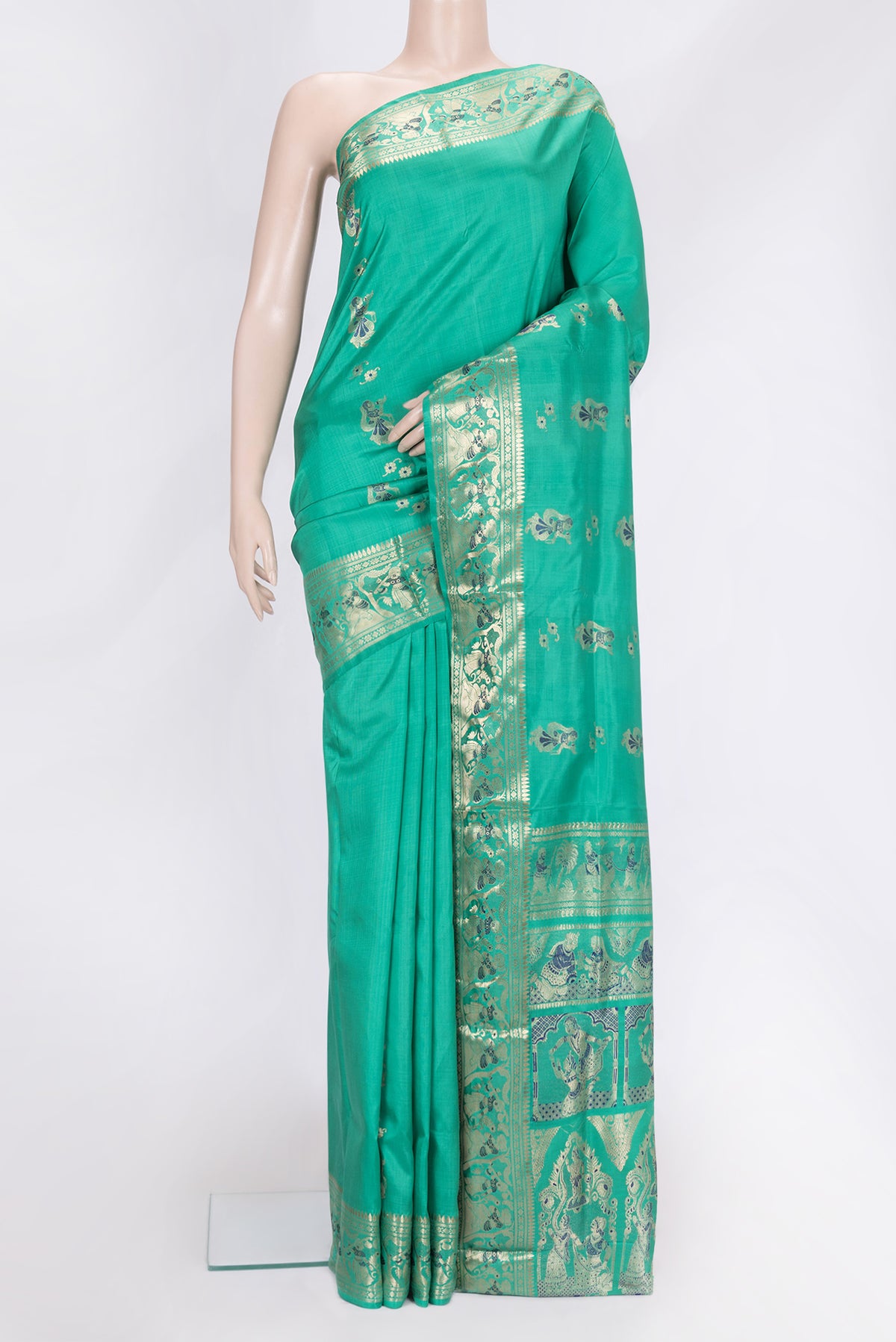 Sea Green Dual Tone Baluchari Silk Saree with Zari And Thread Butta on the body and Fancy Border.  displayed on a mannequin