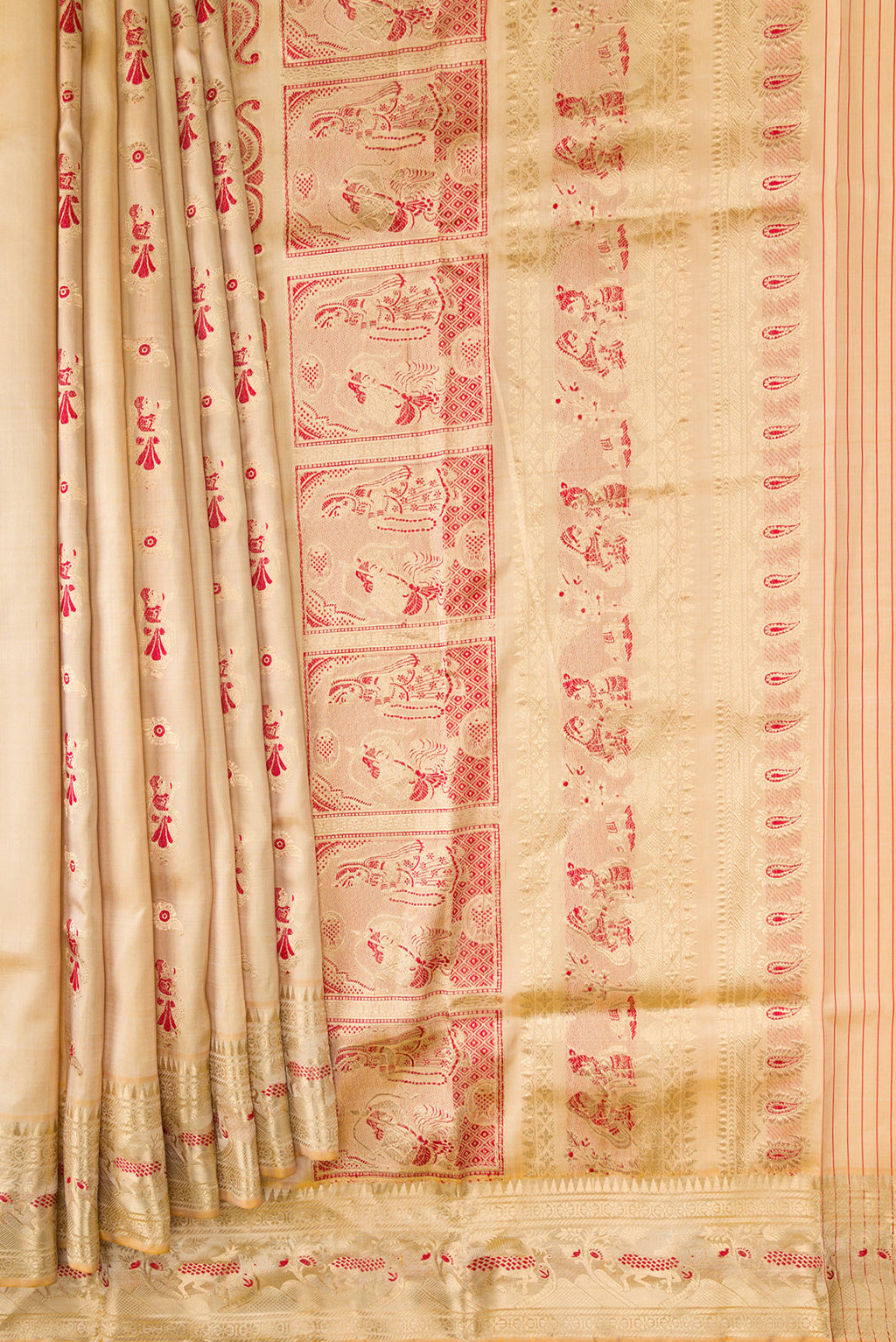 Pleats and pallu of Beige Dual Tone Baluchari Silk Saree with Zari And Thread Butta on the body and Zari Border. 
