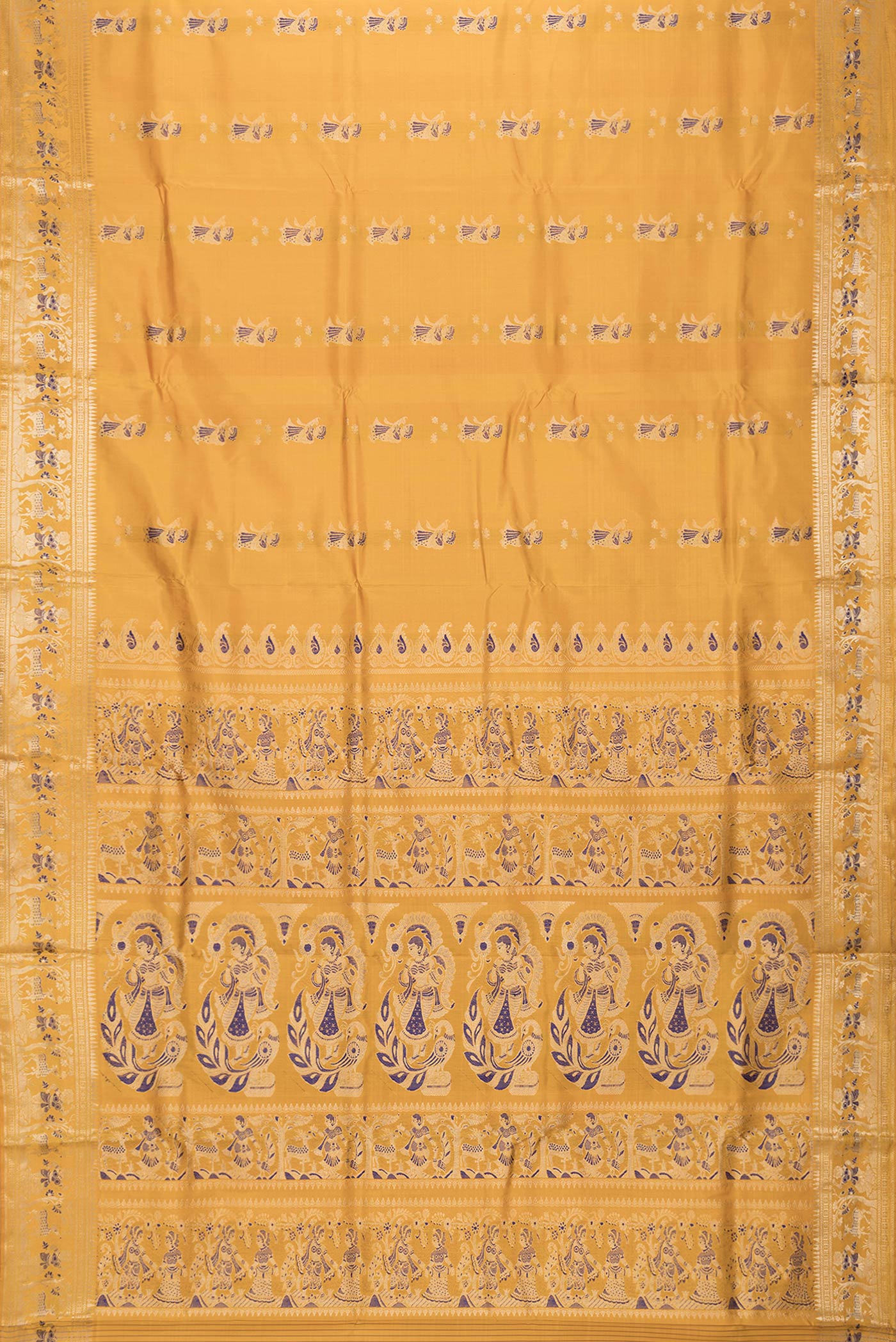 Flat view of Mustard Dual Tone Baluchari Silk Saree with Zari And Thread Butta on the body and Fancy Border. 