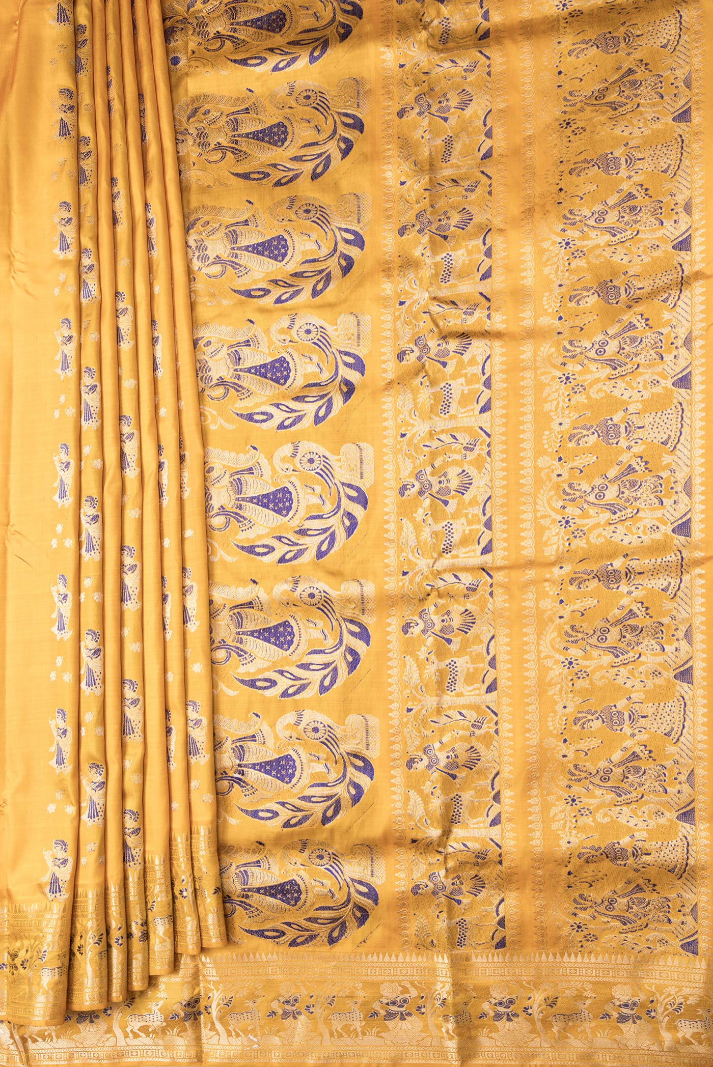 Pleats and pallu of Mustard Dual Tone Baluchari Silk Saree with Zari And Thread Butta on the body and Fancy Border. 
