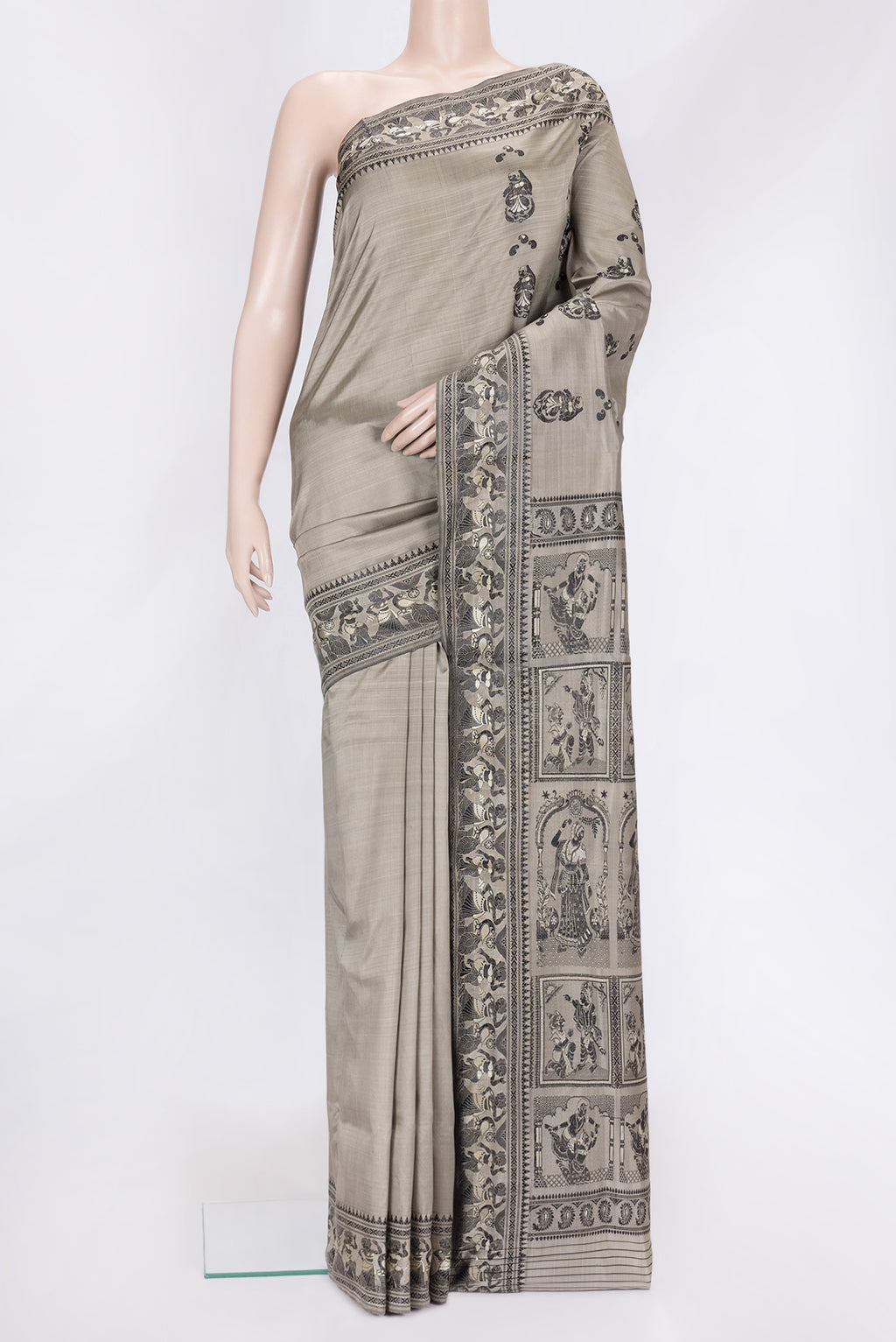 Grey Dual Tone Baluchari Silk Saree with Thread Butta on the body and Fancy Border.  displayed on a mannequin
