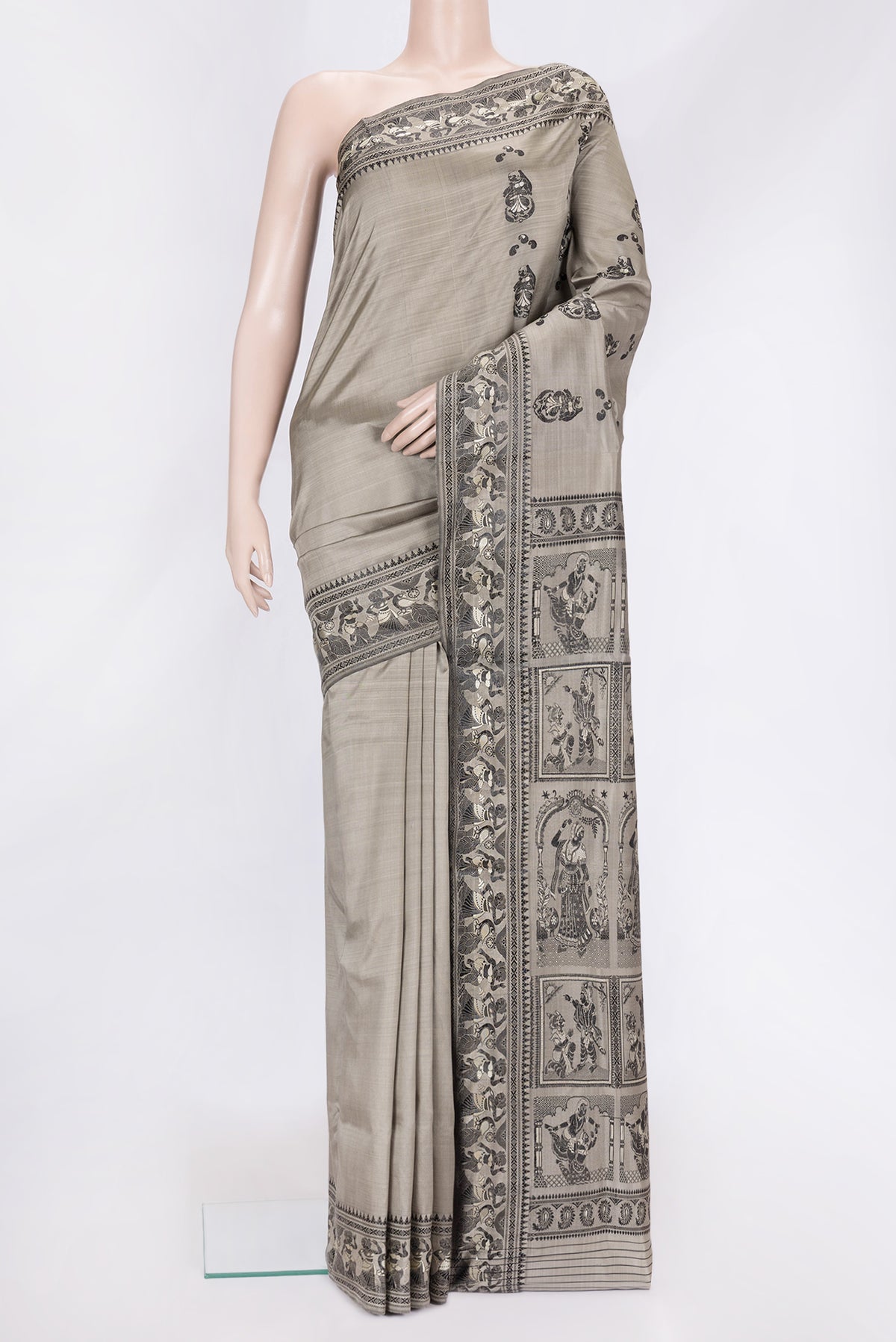 Grey Dual Tone Baluchari Silk Saree with Thread Butta on the body and Fancy Border.  displayed on a mannequin