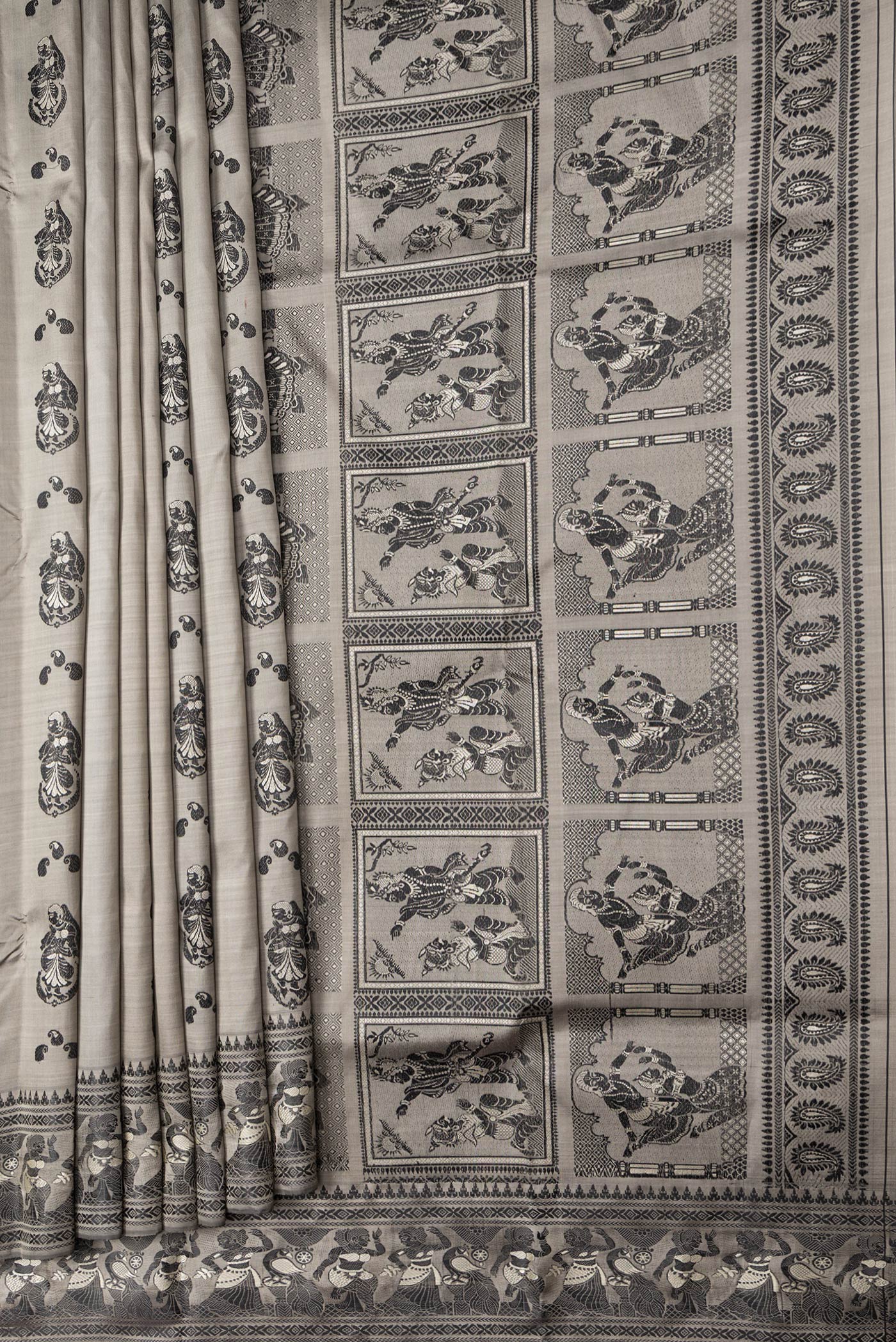 Pleats and pallu of Grey Dual Tone Baluchari Silk Saree with Thread Butta on the body and Fancy Border. 