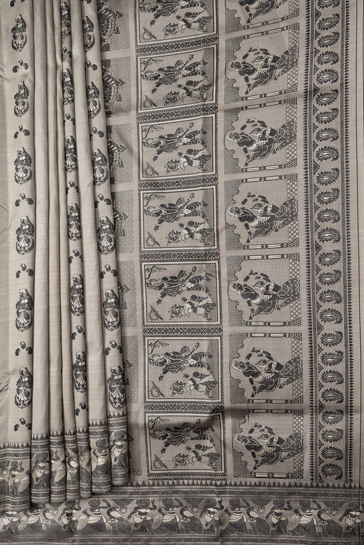 Pleats and pallu of Grey Dual Tone Baluchari Silk Saree with Thread Butta on the body and Fancy Border. 