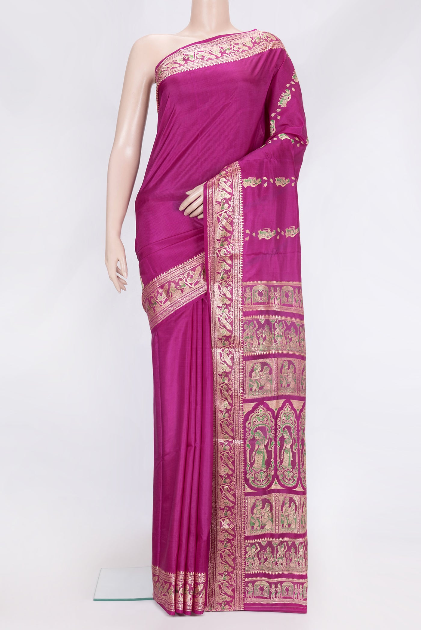 Magenta Dual Tone Baluchari Silk Saree with Thread Butta on the body and Fancy Border.  displayed on a mannequin