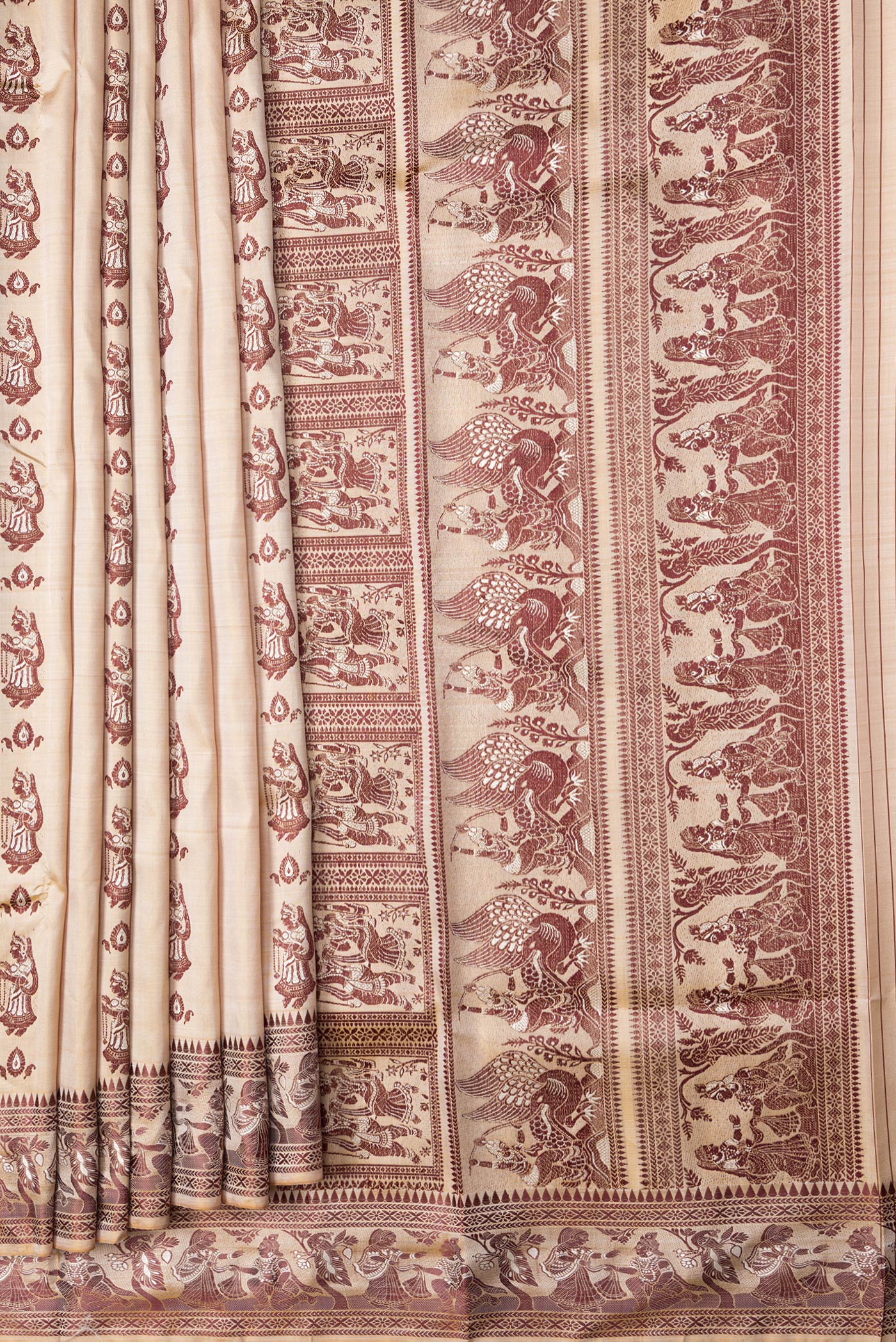 Pleats and pallu of Dark Beige Dual Tone Baluchari Silk Saree with Thread Butta on the body and Thread Border. 