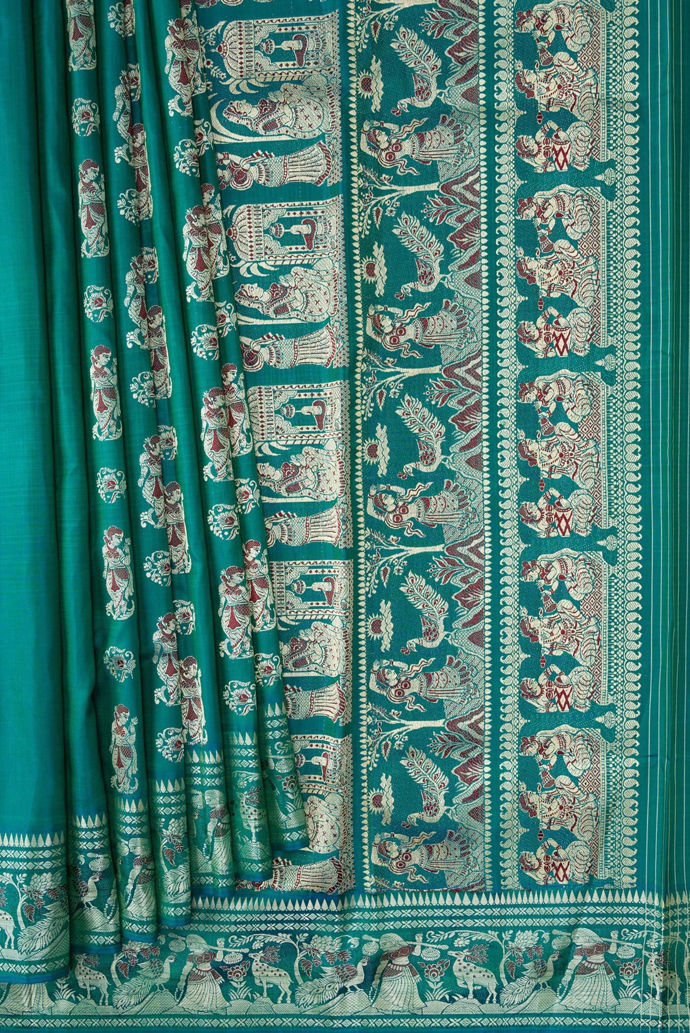 Pleats and pallu of Green Dual Tone Baluchari Silk Saree with Thread Butta on the body and Thread Border. 