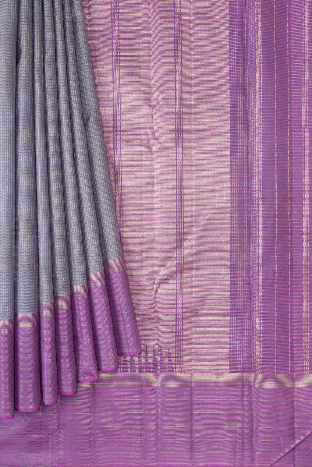 Pleats and pallu of Grey Dual Tone Kanjivaram Silk Saree with Zari Butta on the body and Zari Border. 