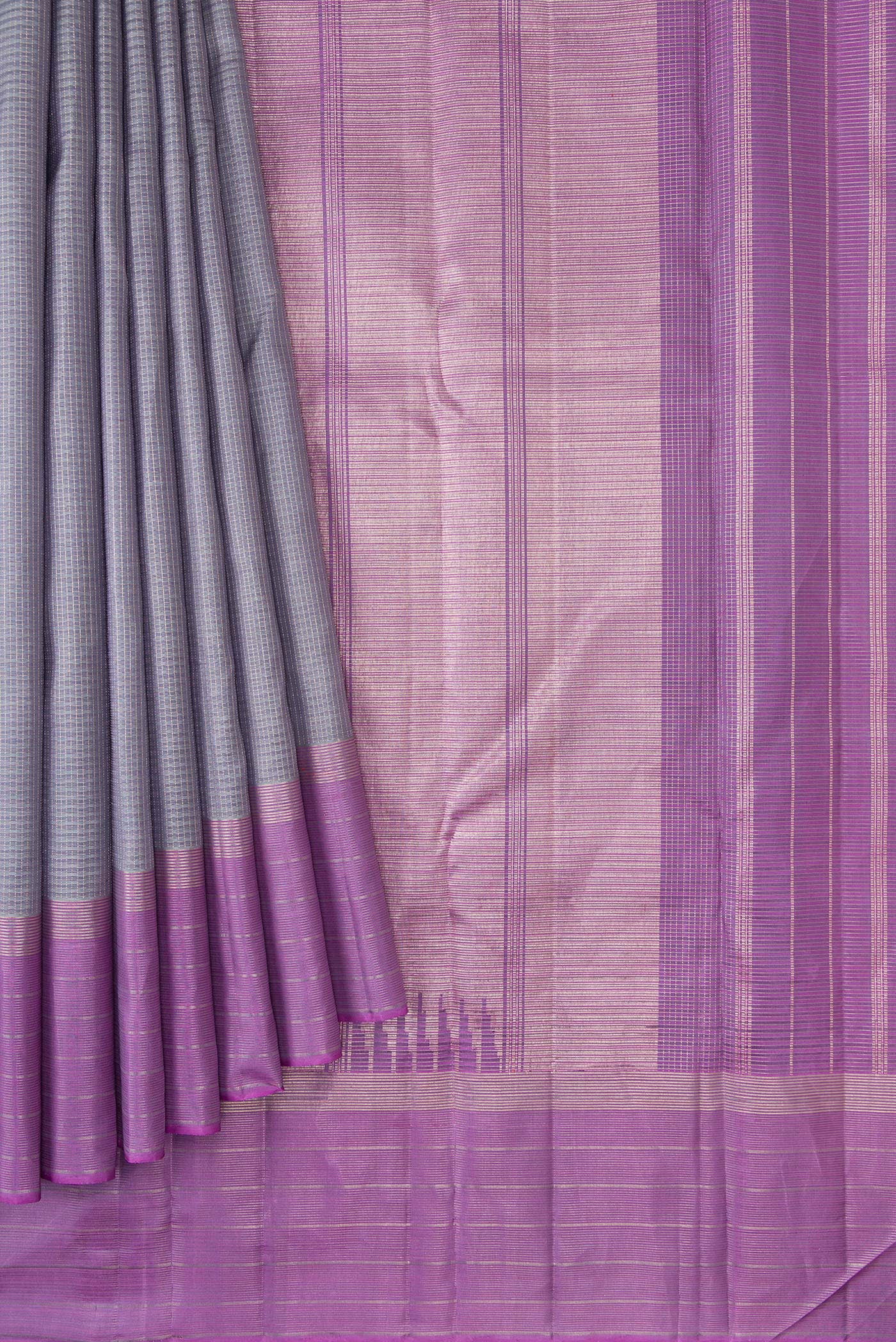 Pleats and pallu of Grey Dual Tone Kanjivaram Silk Saree with Zari Butta on the body and Zari Border. 