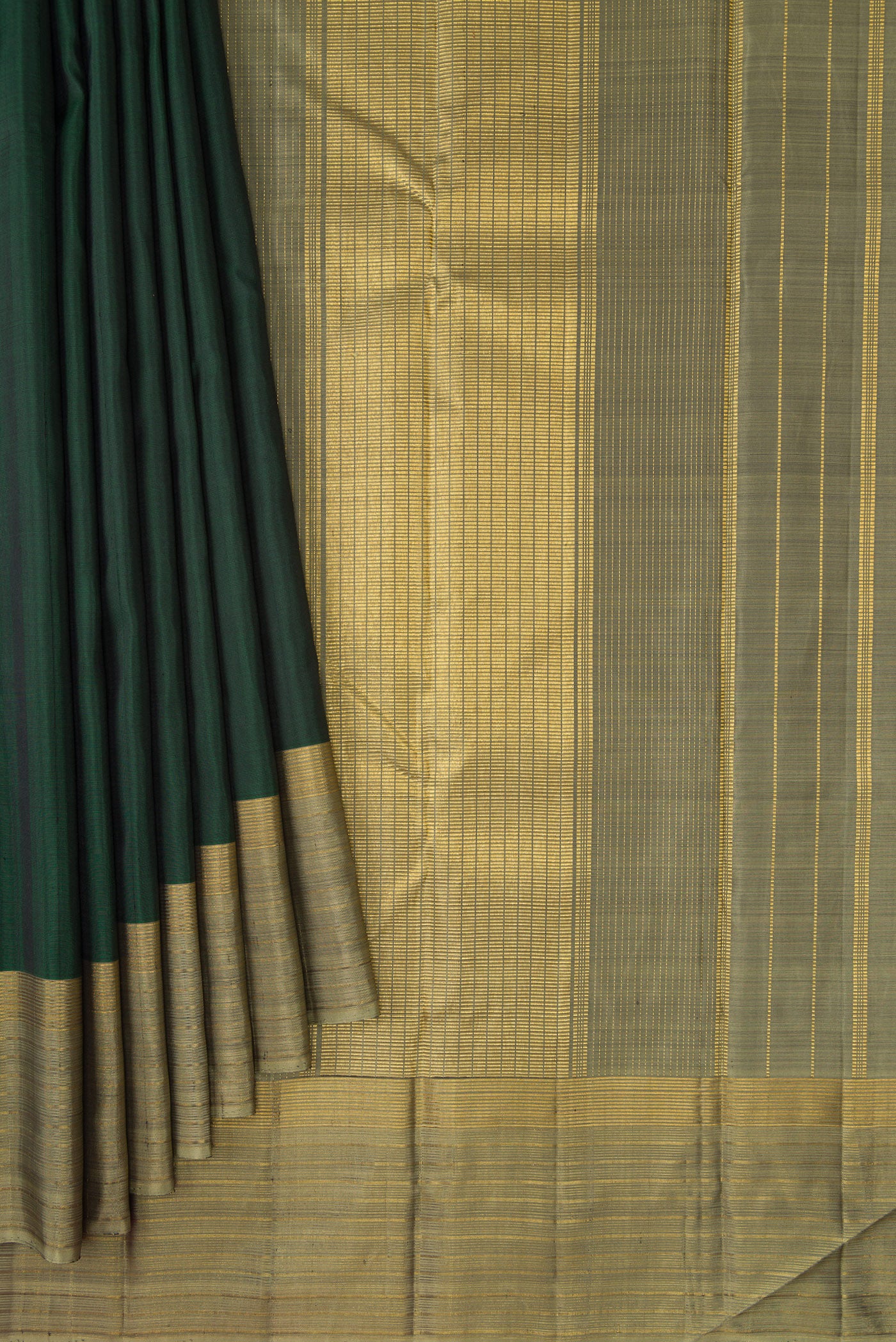 Pleats and pallu of Bottle Green Dual Tone Kanjivaram Silk Saree with Plain Body and Zari Border. 