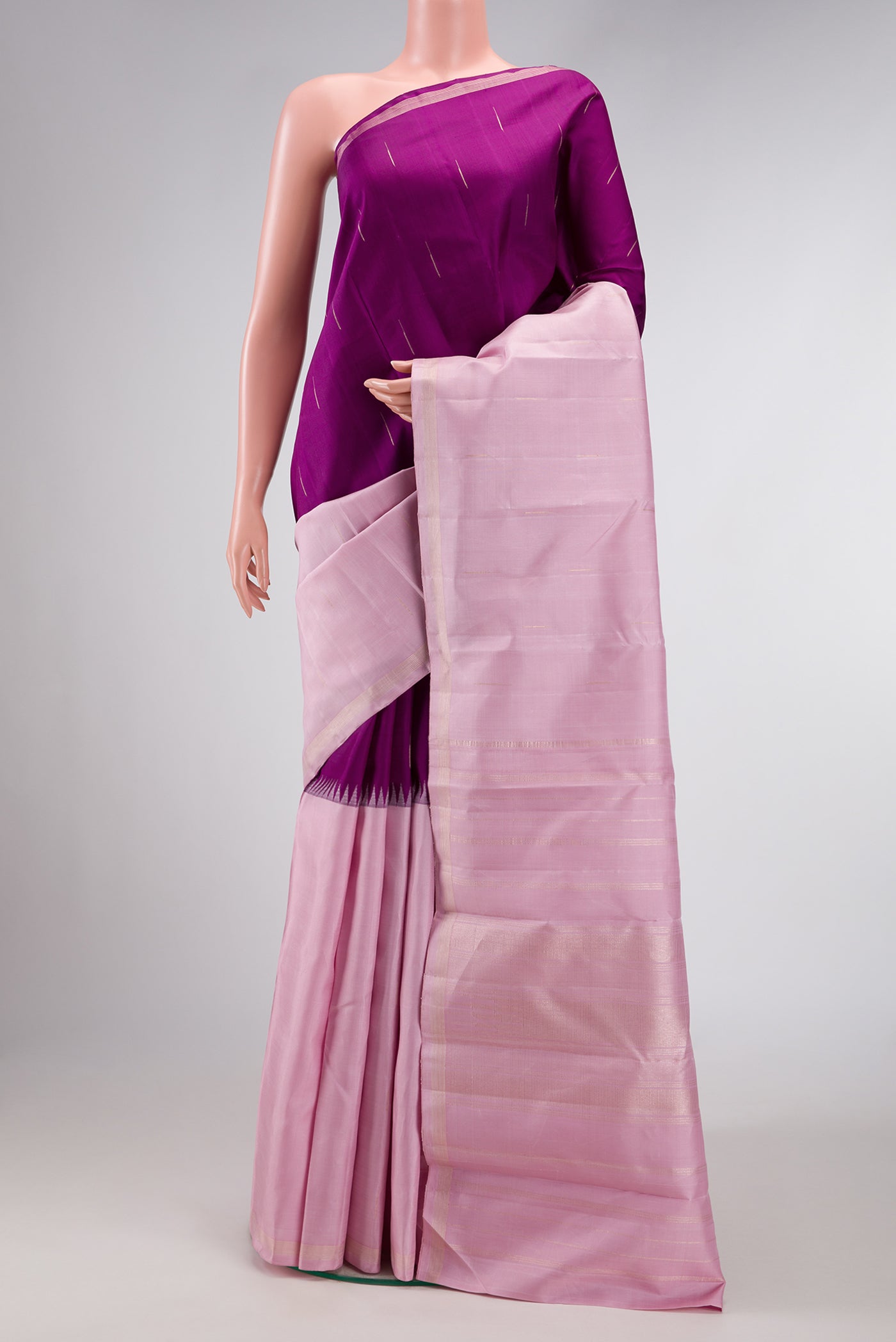 Pink and Purple Color Kanjivaram Silk Saree with Half And Half on the body and Without Border.  displayed on a mannequin