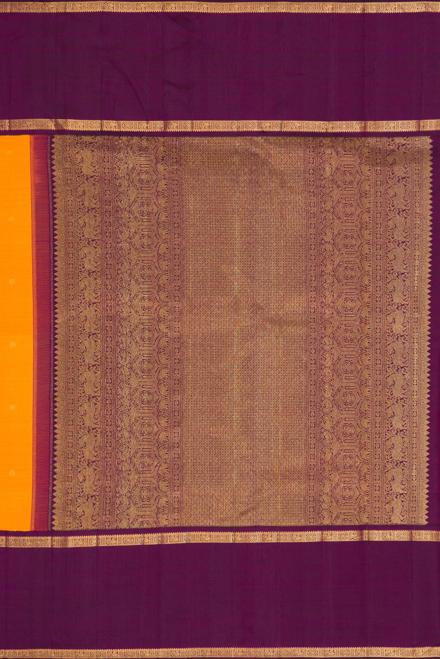 Close up image of the pallu of Mustard Dual Tone Kanjivaram Silk Saree with Zari Butta on the body and Zari Border. 