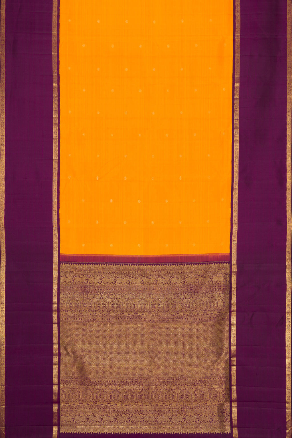 Flat view of Mustard Dual Tone Kanjivaram Silk Saree with Zari Butta on the body and Zari Border. 