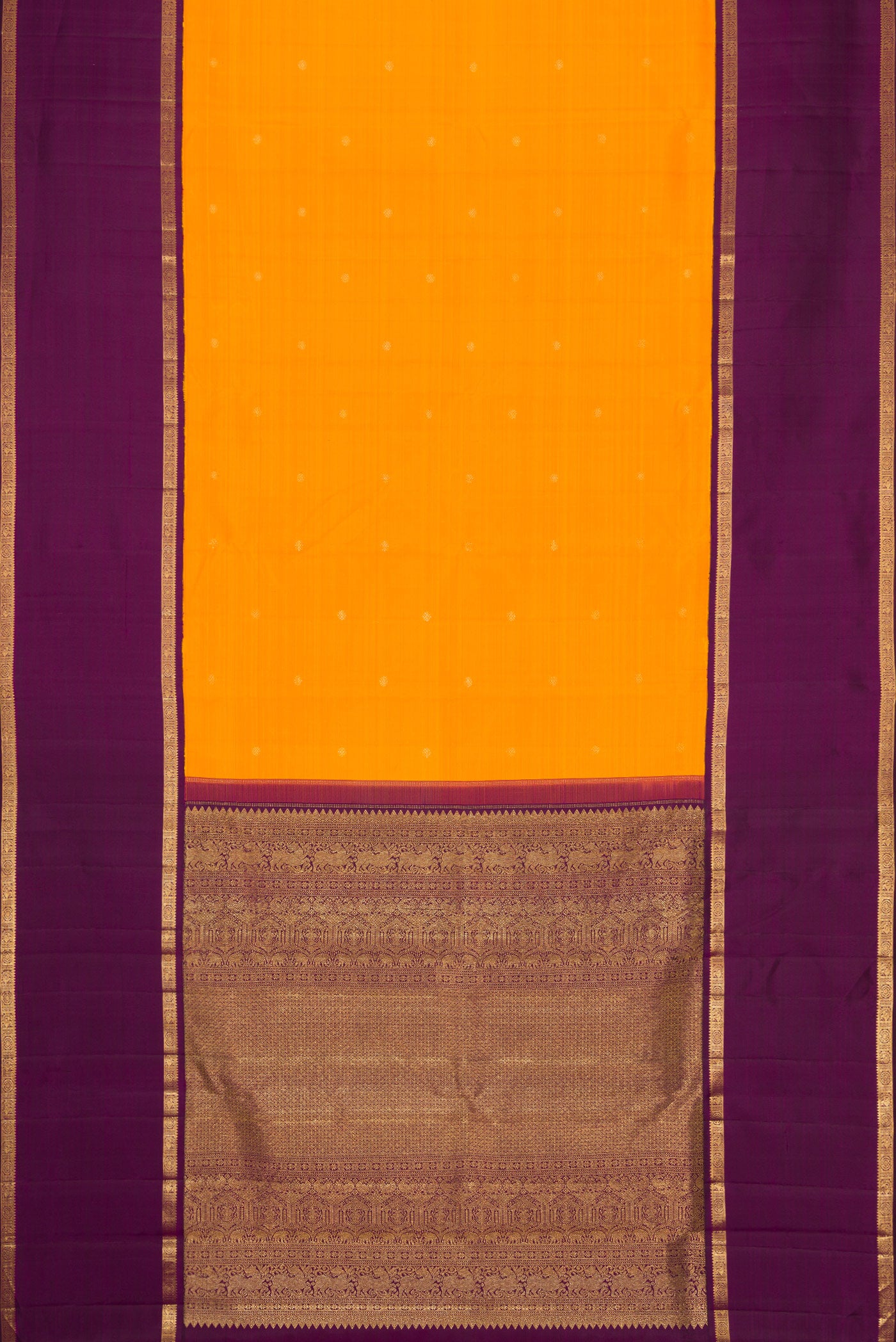 Flat view of Mustard Dual Tone Kanjivaram Silk Saree with Zari Butta on the body and Zari Border. 