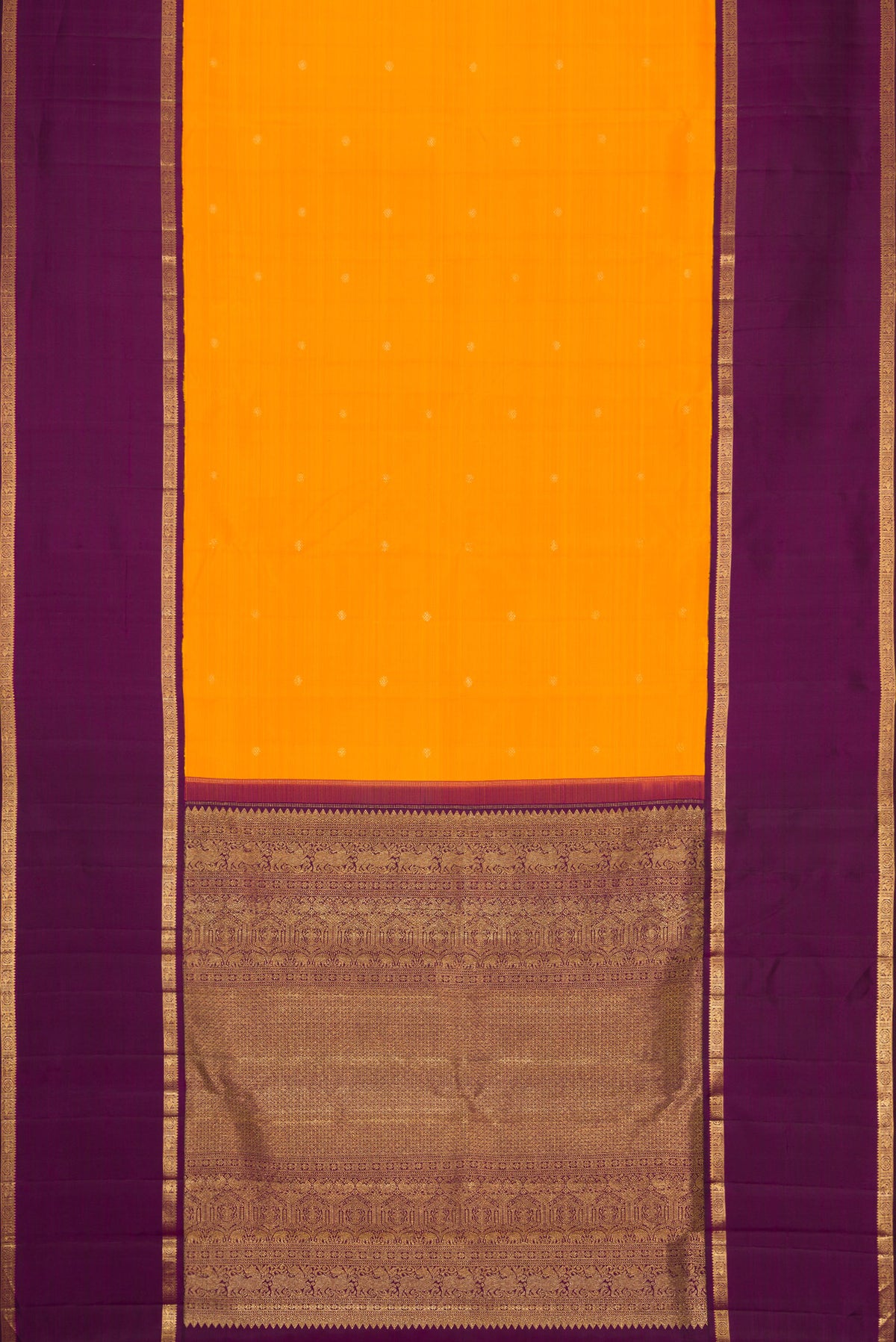 Flat view of Mustard Dual Tone Kanjivaram Silk Saree with Zari Butta on the body and Zari Border. 