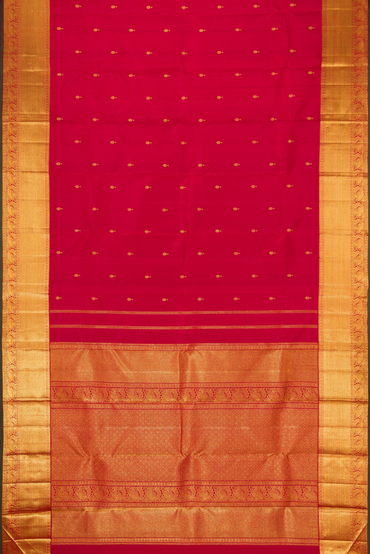 Flat view of Red Dual Tone Kanjivaram Silk Saree with Zari Butta on the body and Zari Border. 