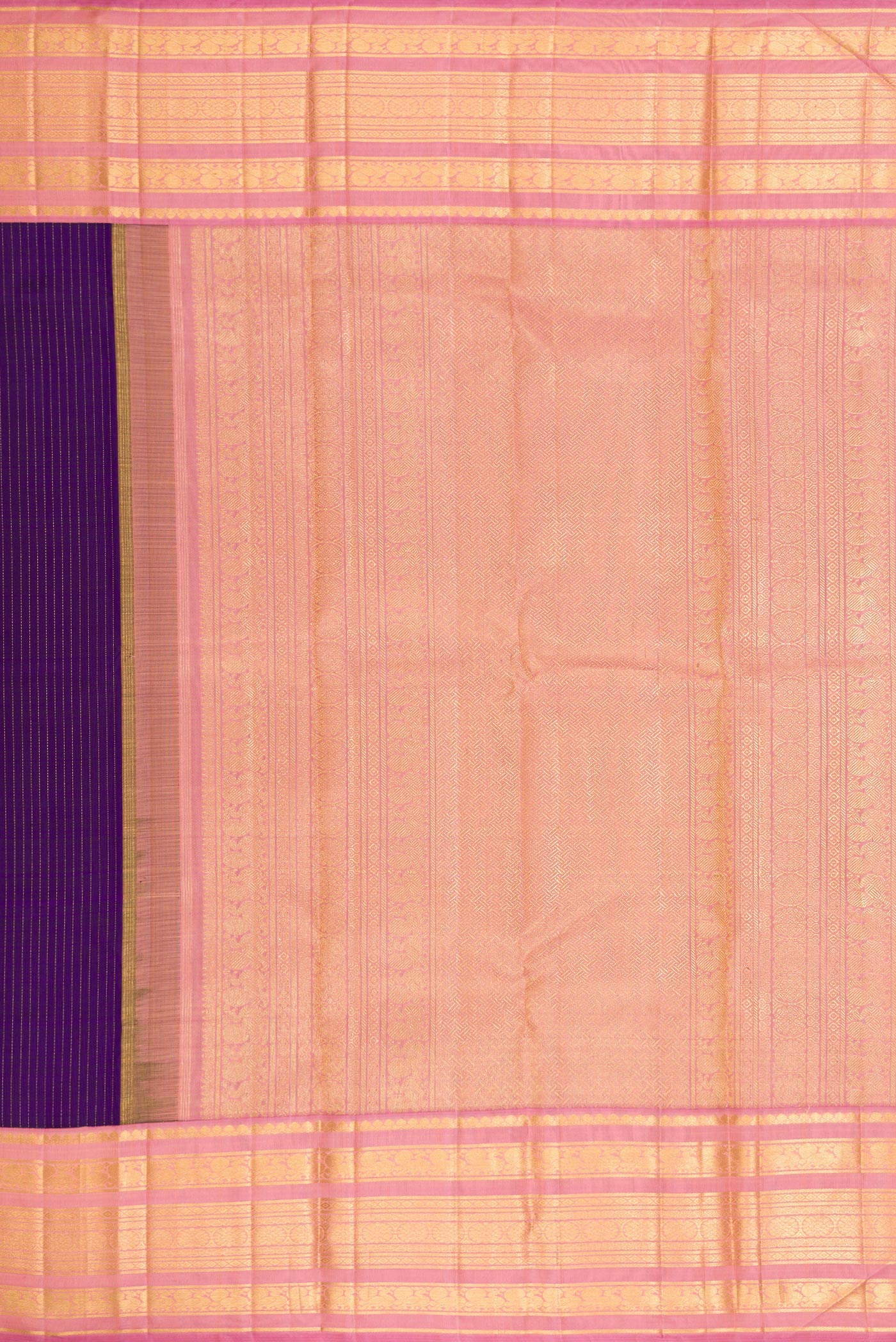 Close up image of the pallu of Violet Dual Tone Kanchipuram Silk Saree with Stripes on the body and Zari Border. 