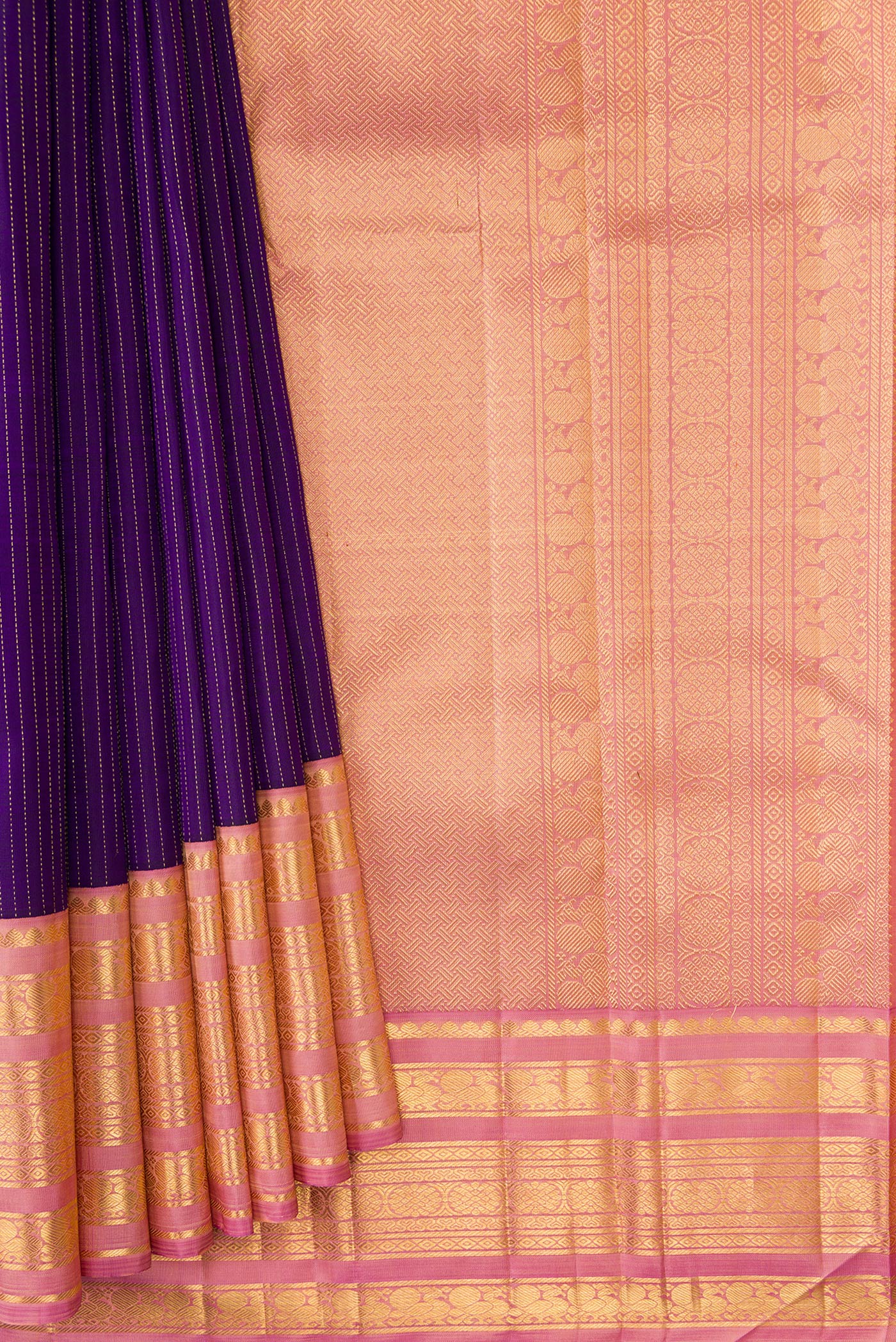 Pleats and pallu of Violet Dual Tone Kanchipuram Silk Saree with Stripes on the body and Zari Border. 
