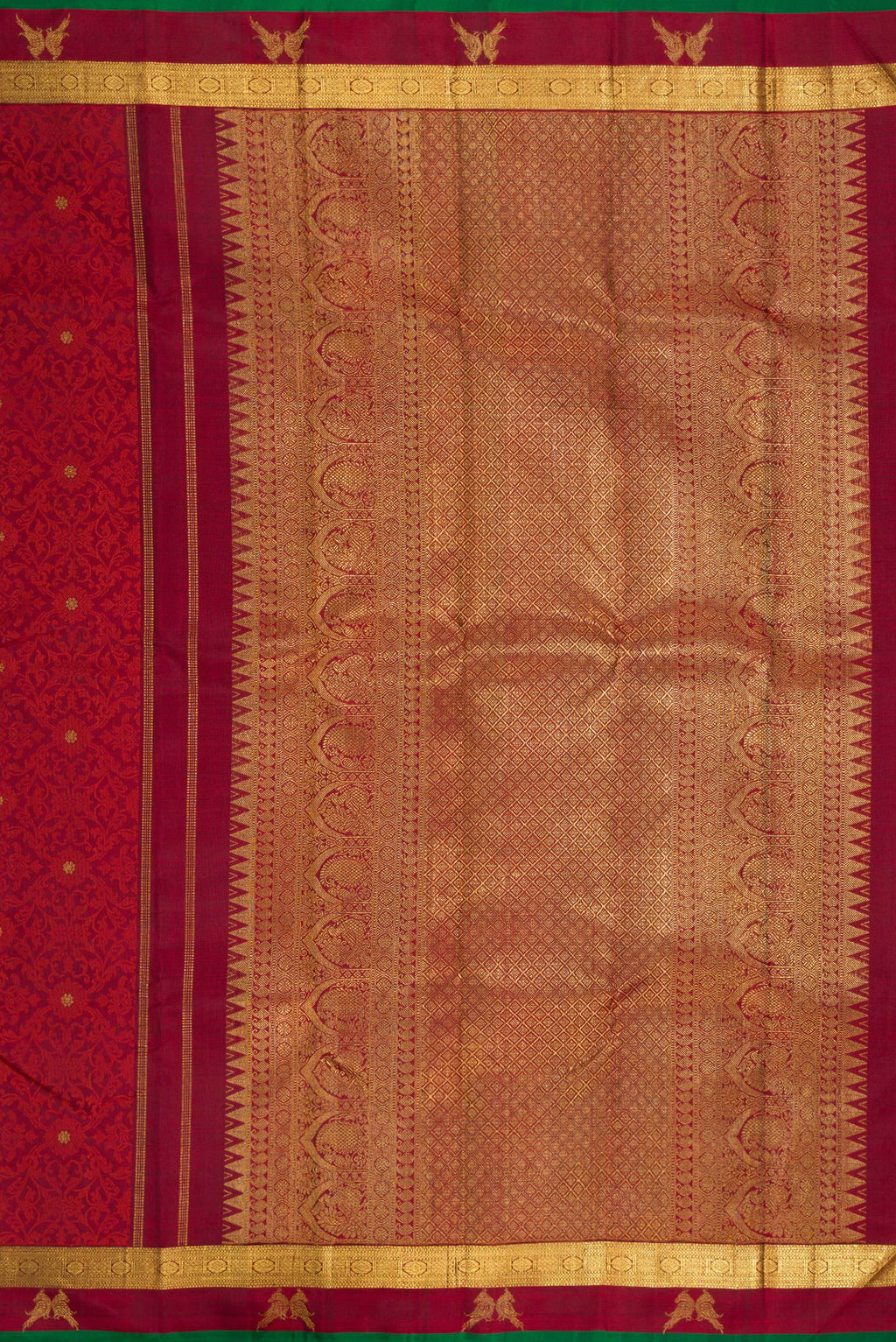 Close up image of the pallu of Maroon Dual Tone Kanchipuram Silk Saree with Jacquard With Zari Butta on the body and Zari Border. 