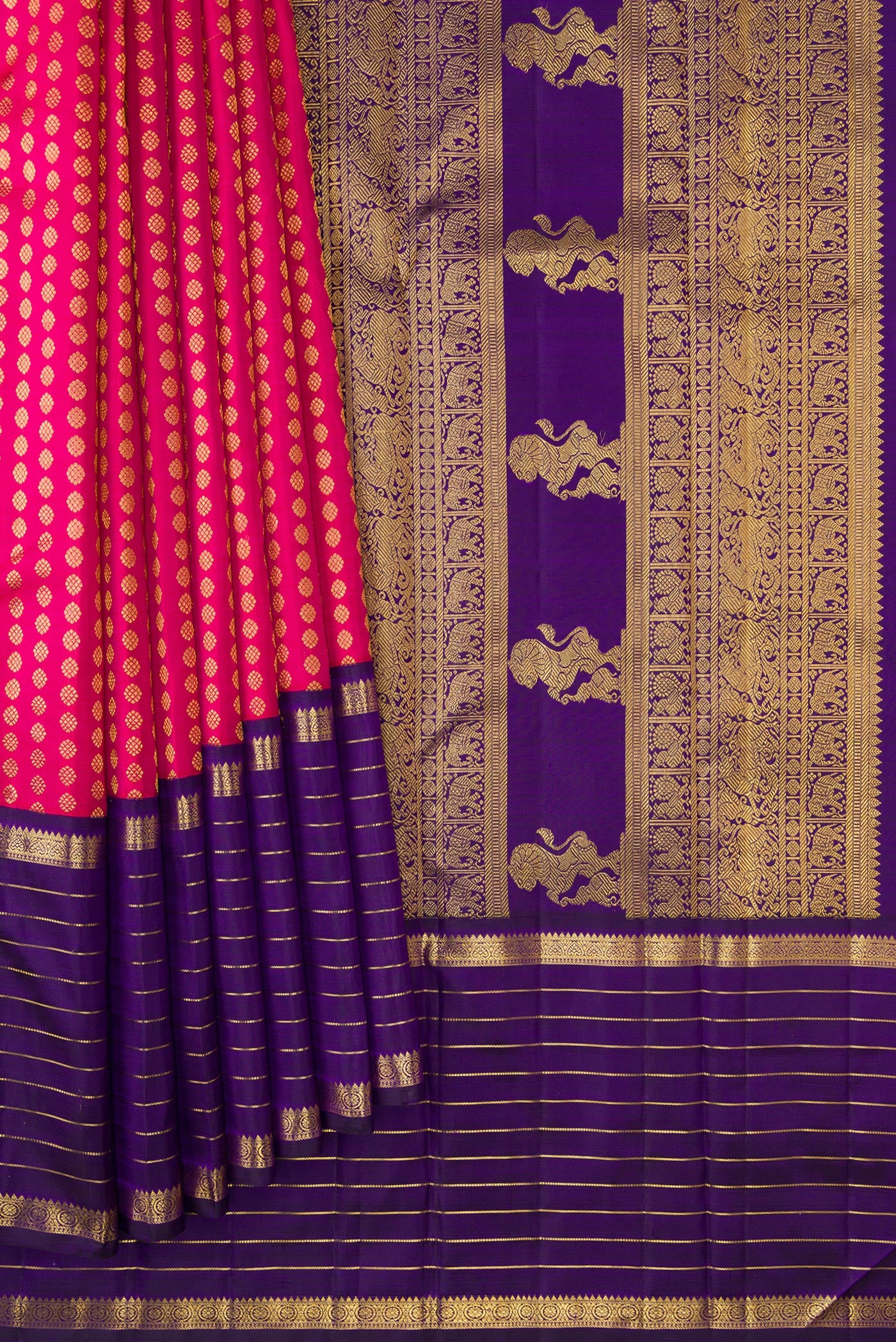 Pleats and pallu of Pink Dual Tone Kanchipuram Silk Saree with Zari Butta on the body and Zari Border. 