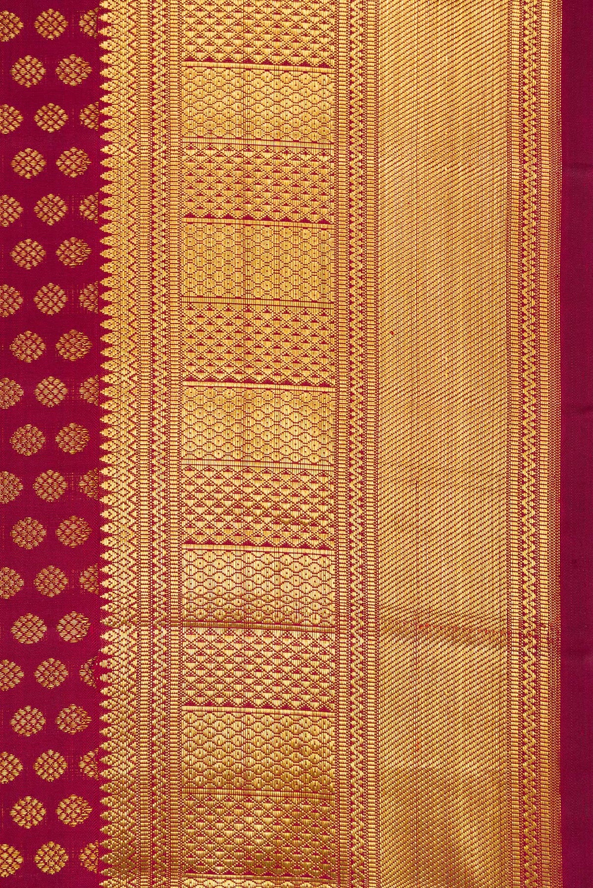 Border image of Maroon Dual Tone Kanchipuram Silk Saree with Zari Brocade on the body and Zari Border. 