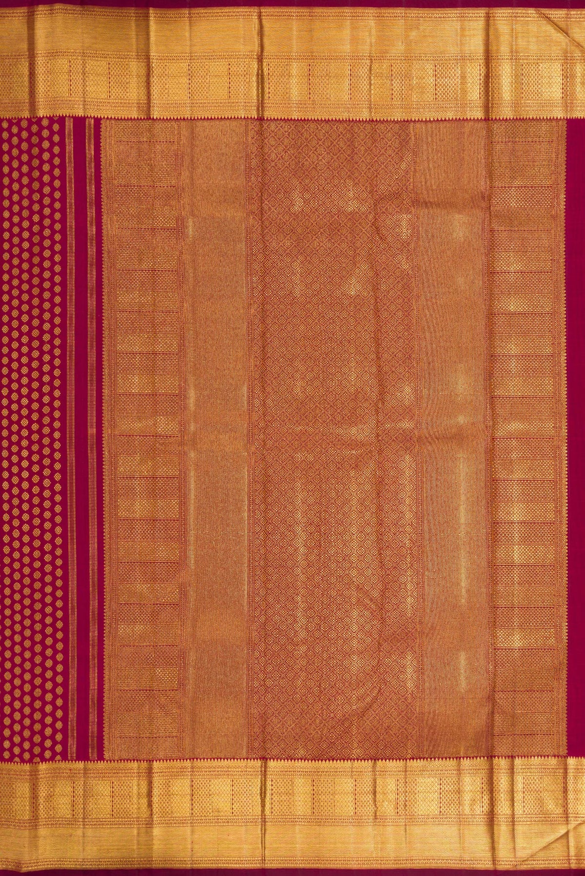 Close up image of the pallu of Maroon Dual Tone Kanchipuram Silk Saree with Zari Brocade on the body and Zari Border. 