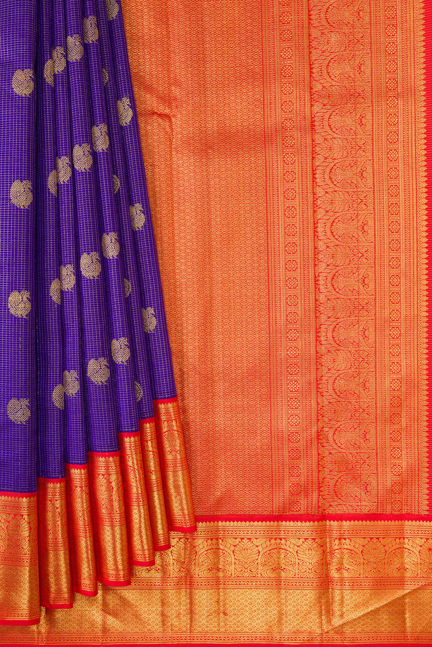 Pleats and pallu of Royal Blue Dual Tone Kanchipuram Silk Saree with Checked design on the body and Zari Border. 