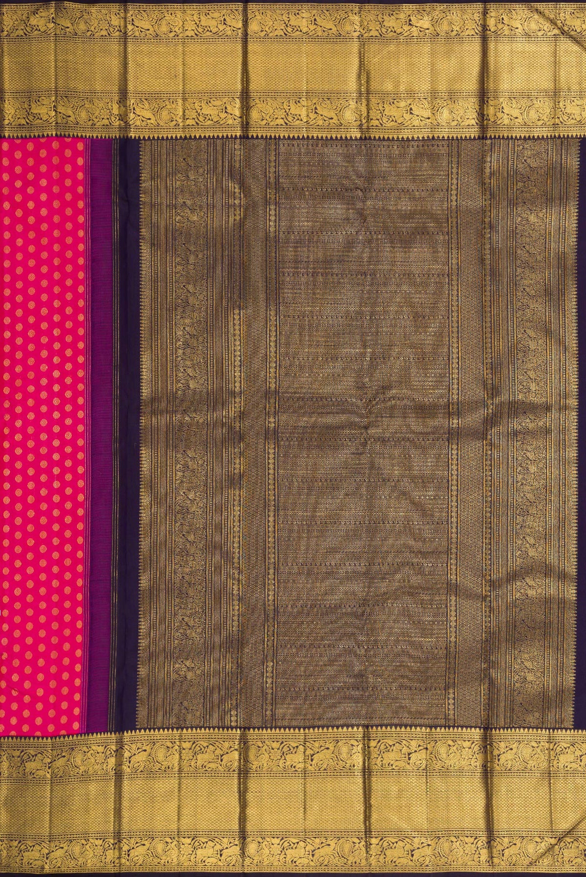 Close up image of the pallu of Pink Dual Tone Kanchipuram Silk Saree with Zari Butta on the body and Zari Border. 