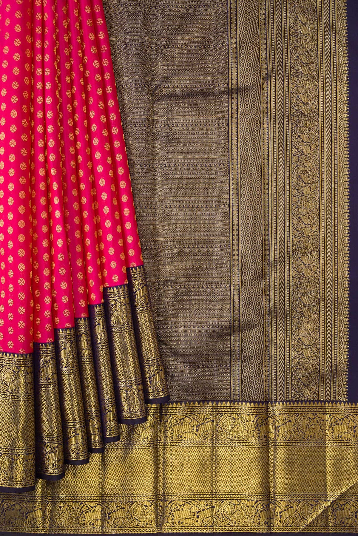 Pleats and pallu of Pink Dual Tone Kanchipuram Silk Saree with Zari Butta on the body and Zari Border. 