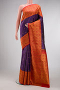 Violet Dual Tone Kanchipuram Silk Saree with Zari Butta on the body and Zari Border.  displayed on a mannequin