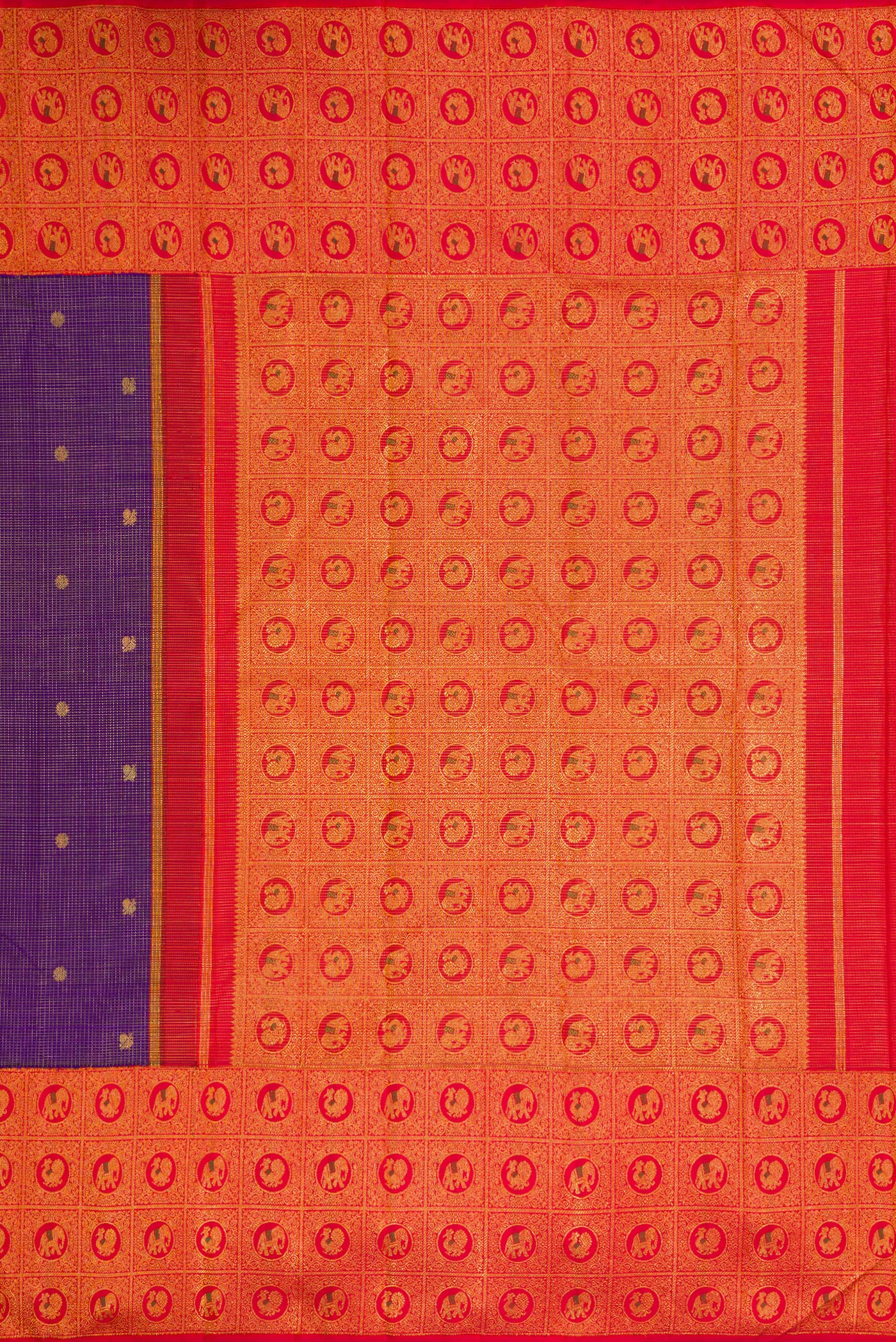 Close up image of the pallu of Violet Dual Tone Kanchipuram Silk Saree with Zari Butta on the body and Zari Border. 