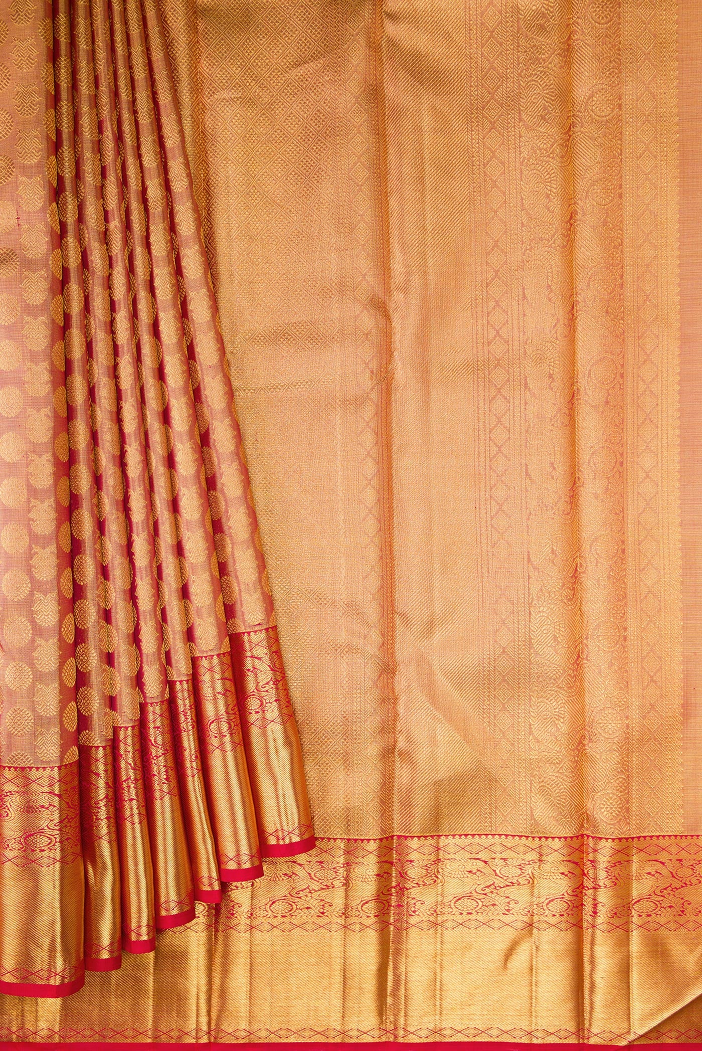 Pleats and pallu of Dark Pink Dual Tone Kanchipuram Tissue Silk Saree with Zari Brocade on the body and Zari Border. 