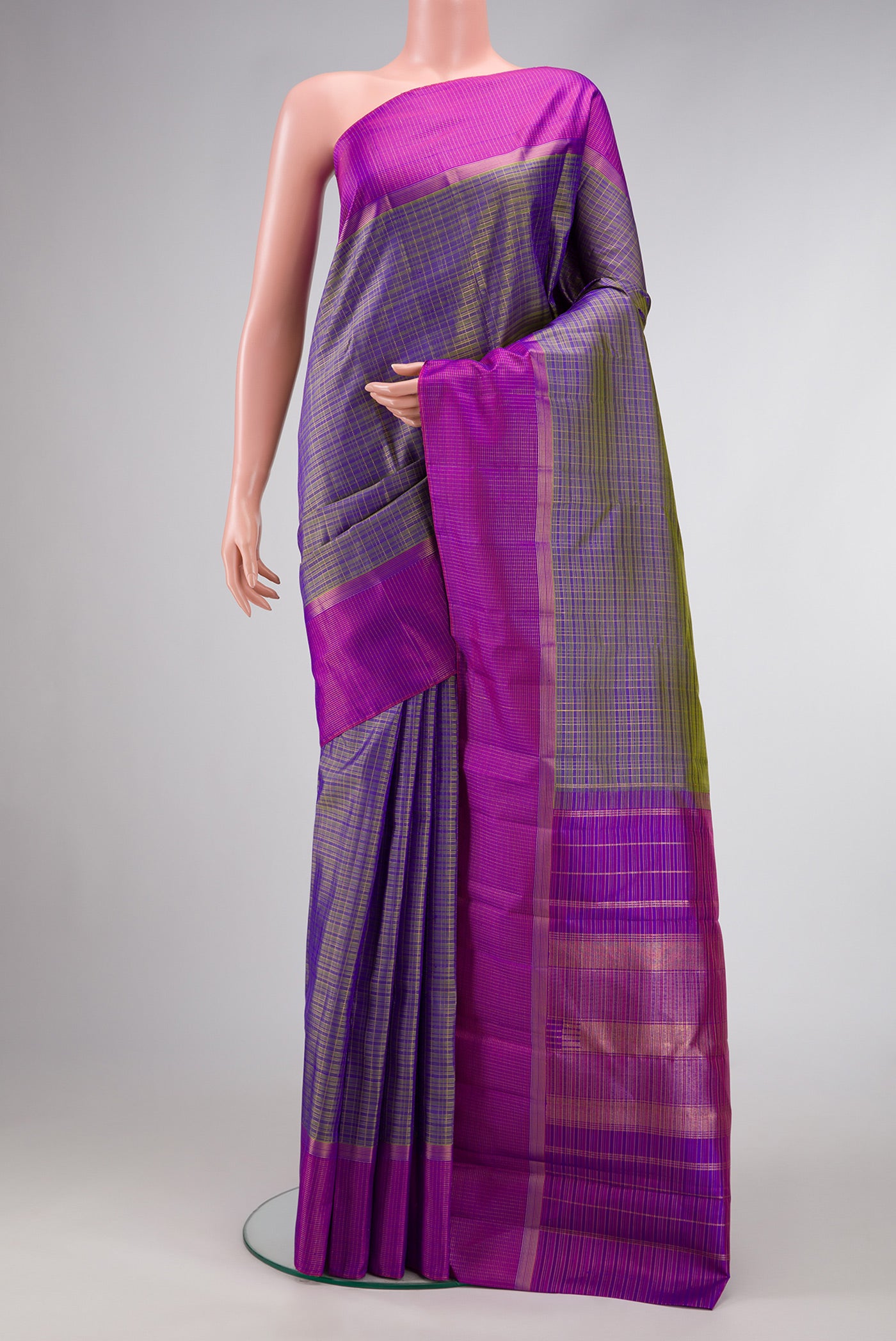 Blue Dual Tone Kanjivaram Silk Saree with Checked design on the body and Zari Border.  displayed on a mannequin