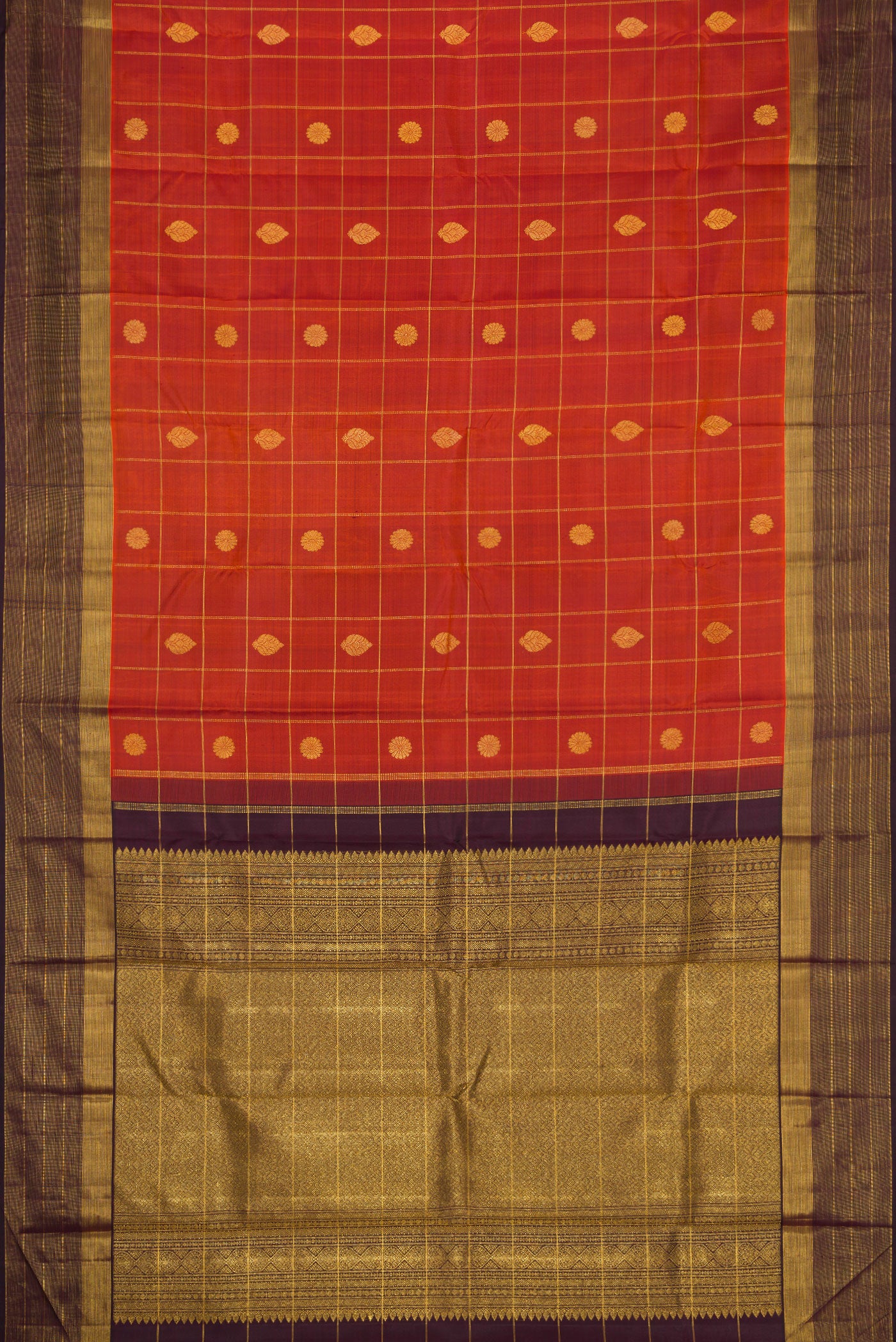Flat view of Brick Orange Dual Tone Kanjivaram Silk Saree with Checked design on the body and Zari Border. 