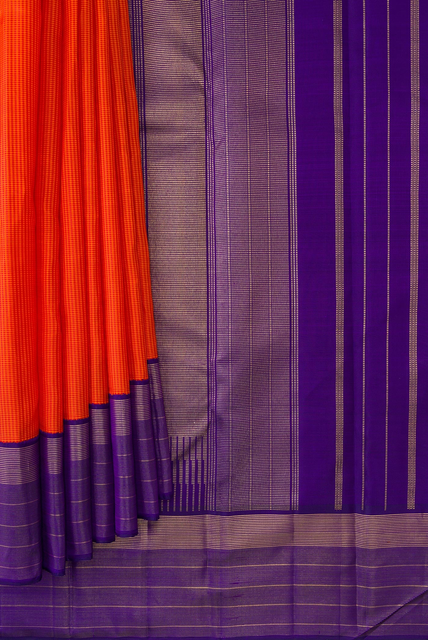 Pleats and pallu of Pure Silk Pure Zari Orange Dual Tone Kanjivaram Saree with Checked design on the body and Zari Border. 
